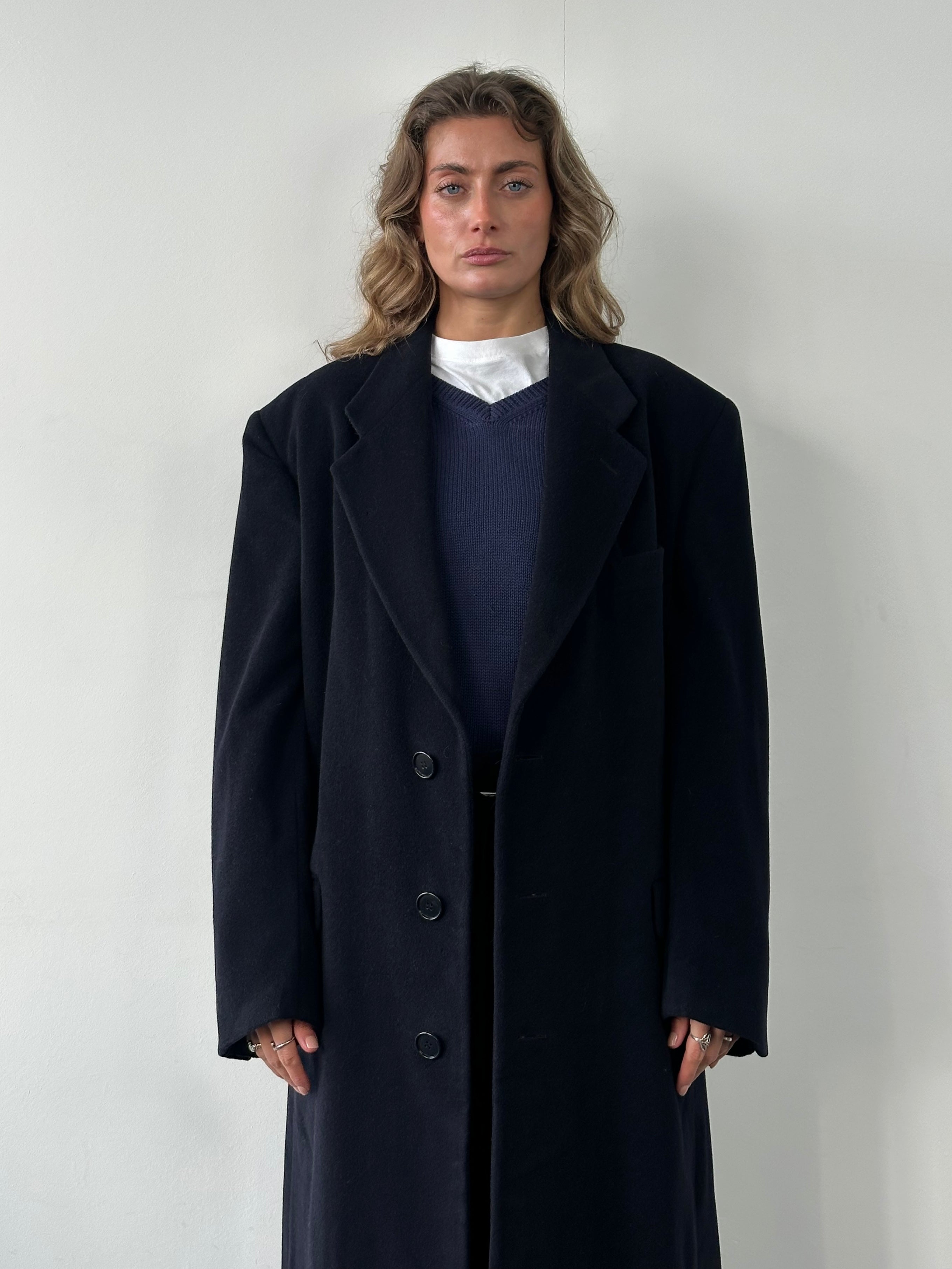 Giorgio Armani Le Collezioni men's XXL pure wool single-breasted coat displayed on a hanger, showcasing classic tailored style.