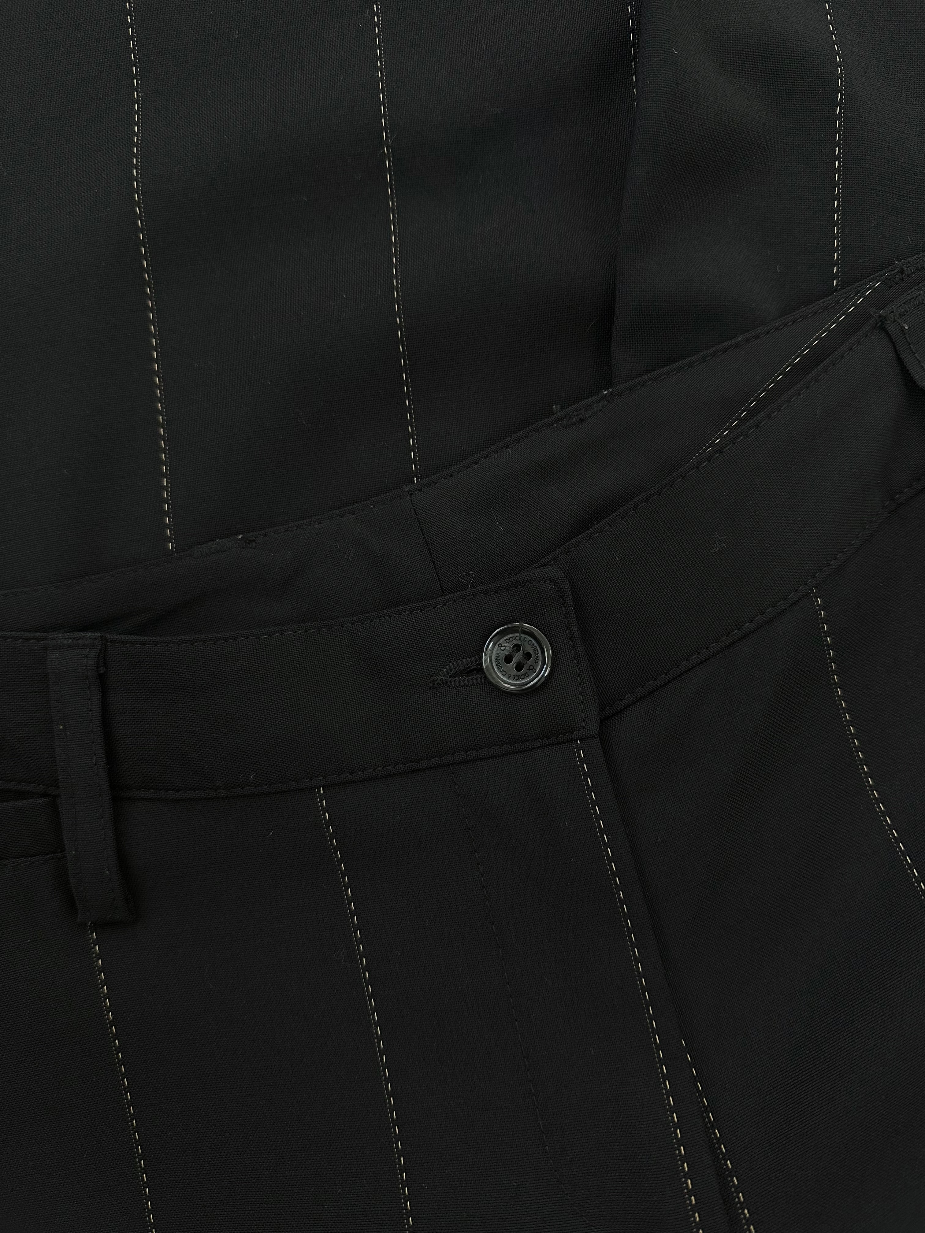Dolce & Gabbana 2000s wool trousers in size W28, featuring a classic tailored fit and neutral color.