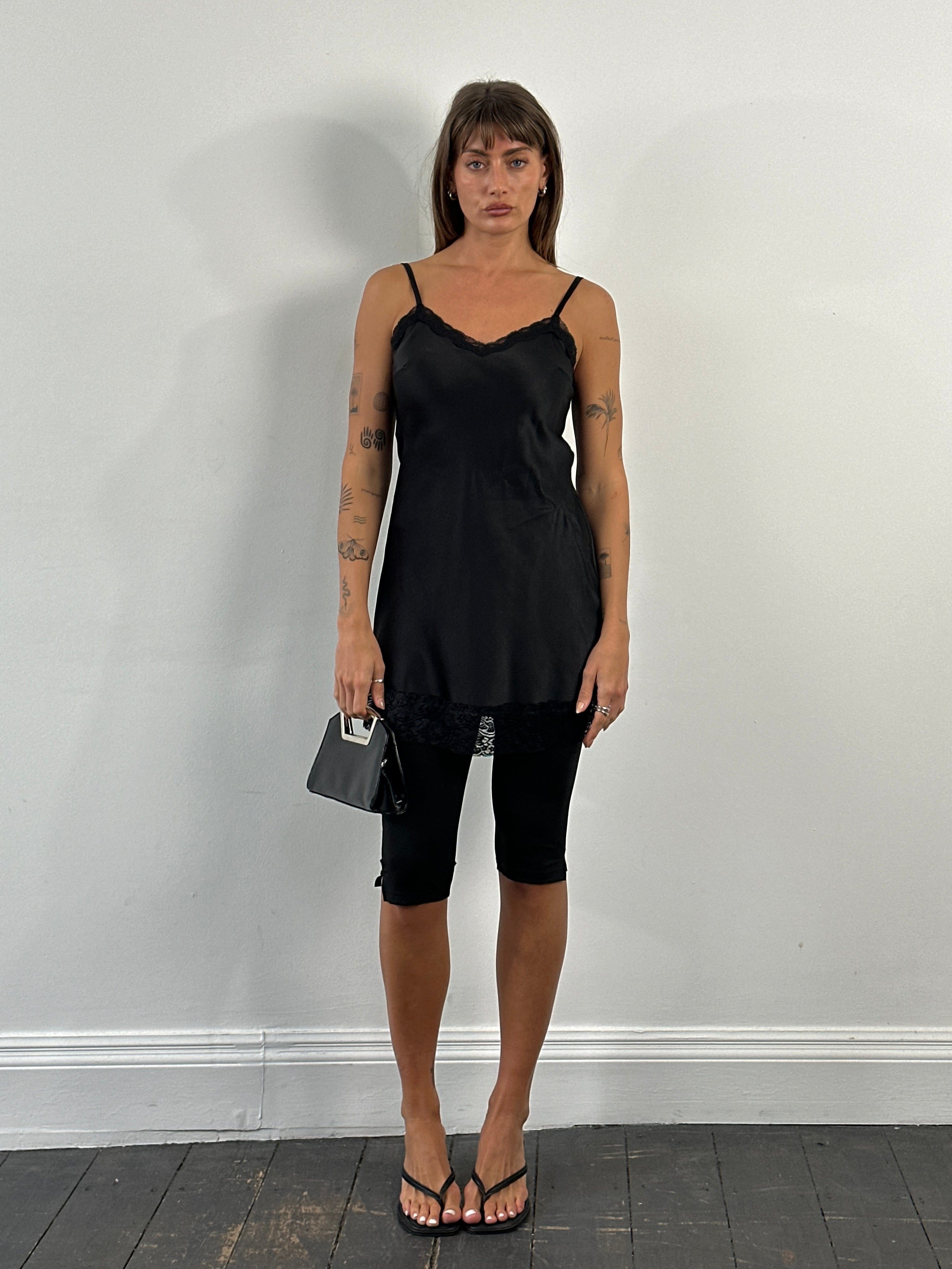 Vintage 2000s lace mini satin slip dress in size small, featuring delicate lace details and a sleek satin finish.