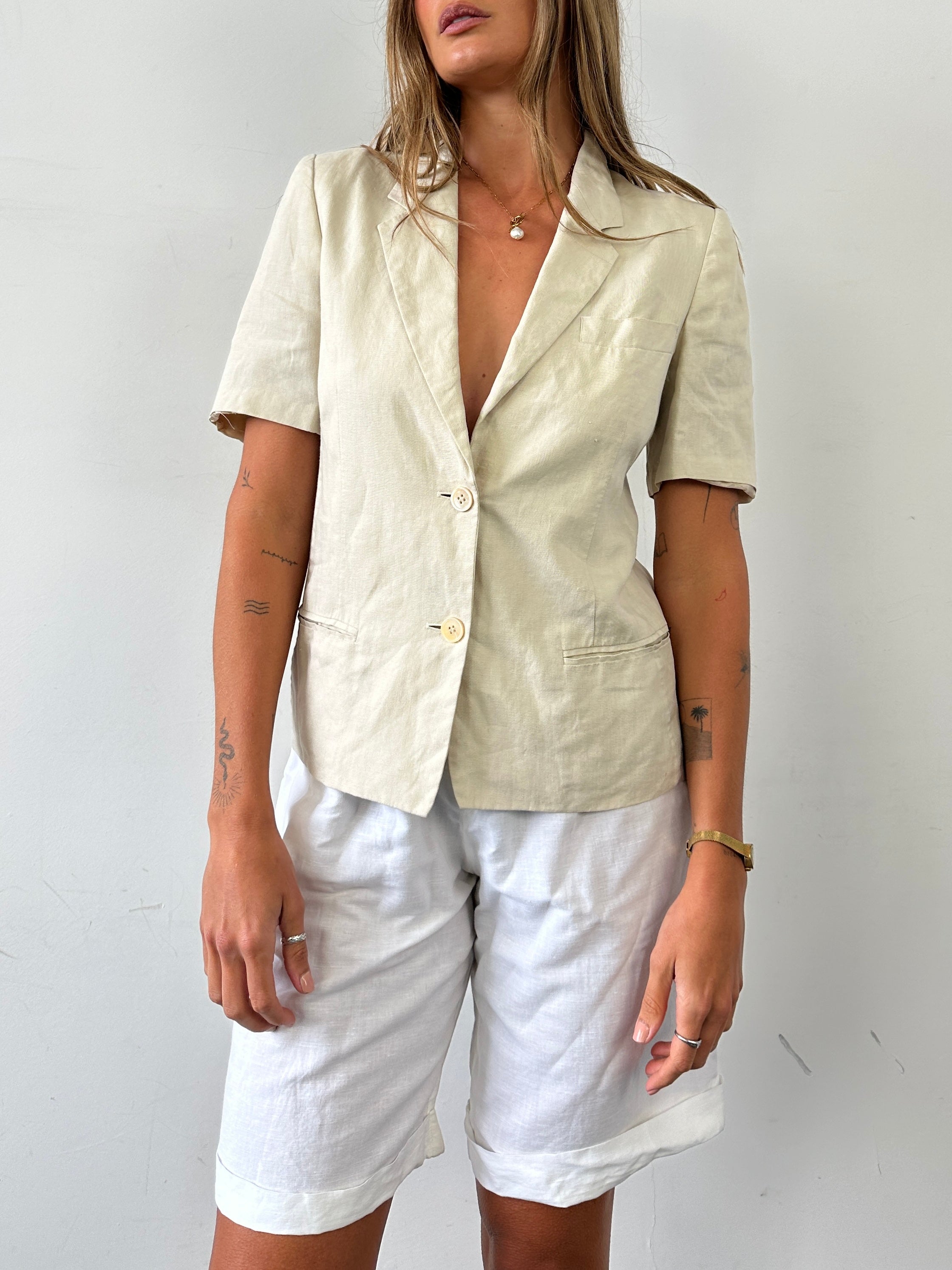 Max Mara pure linen short sleeve blazer in size S/M, lightweight and stylish, shown on a neutral background.