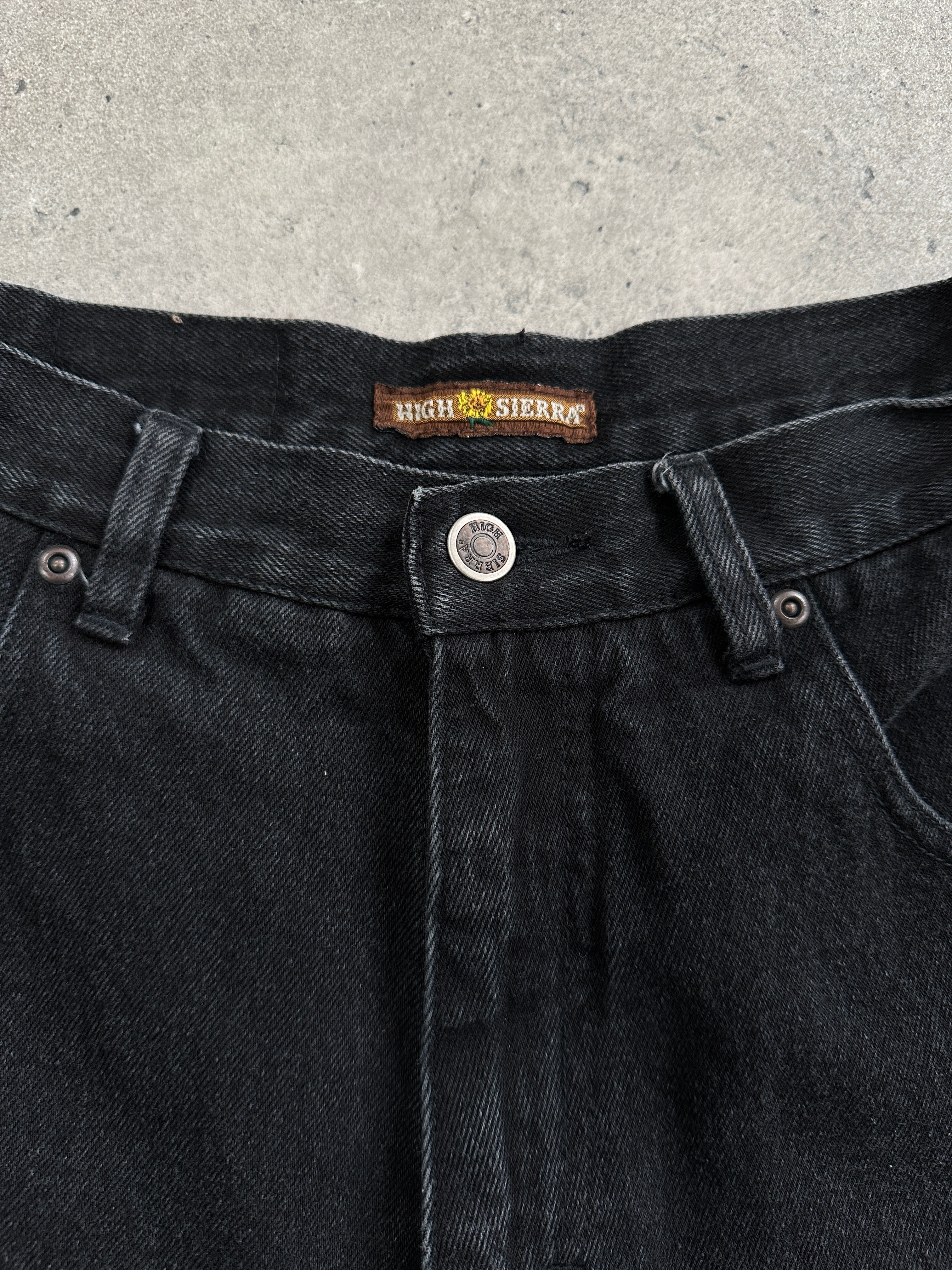 Vintage high waisted denim shorts in W25 style, showcasing classic blue denim with distressed details and a vintage fit.