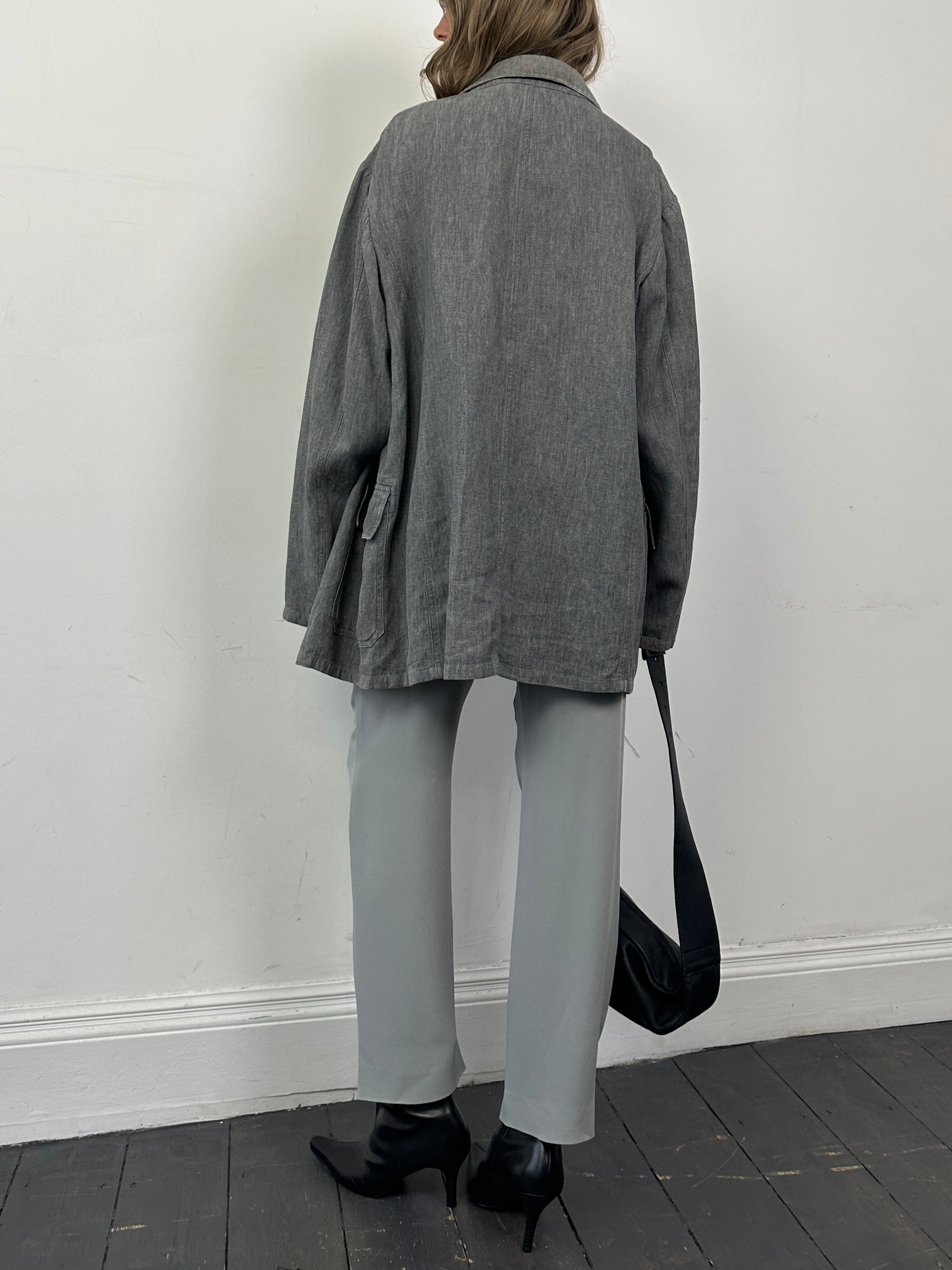 Armani Collezioni relaxed pure linen bomber jacket in XL, beige color, with front zipper and ribbed cuffs.