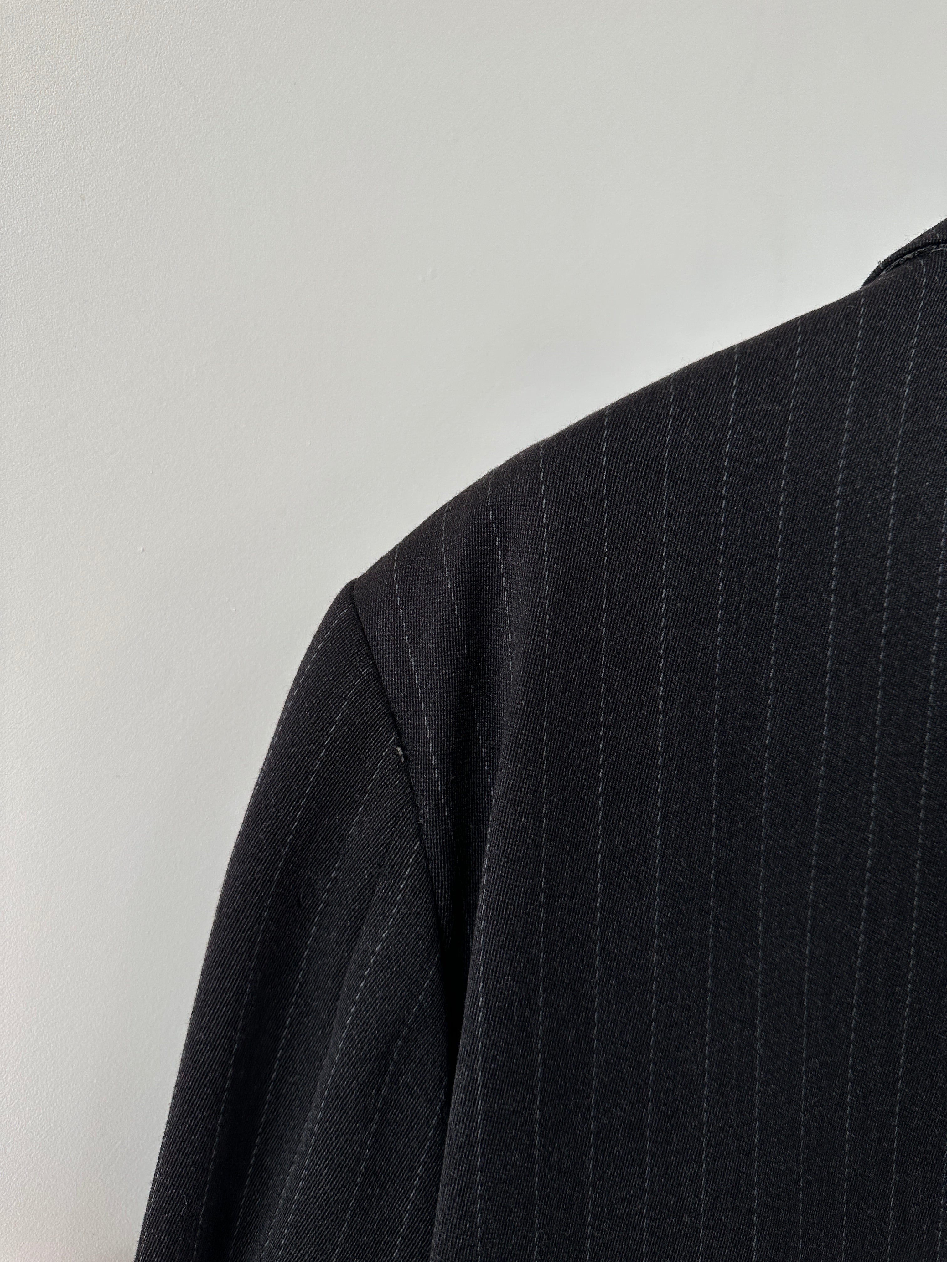 Kenzo wool pinstripe single-breasted blazer in size 44R, tailored fit with classic lapel and button closure.