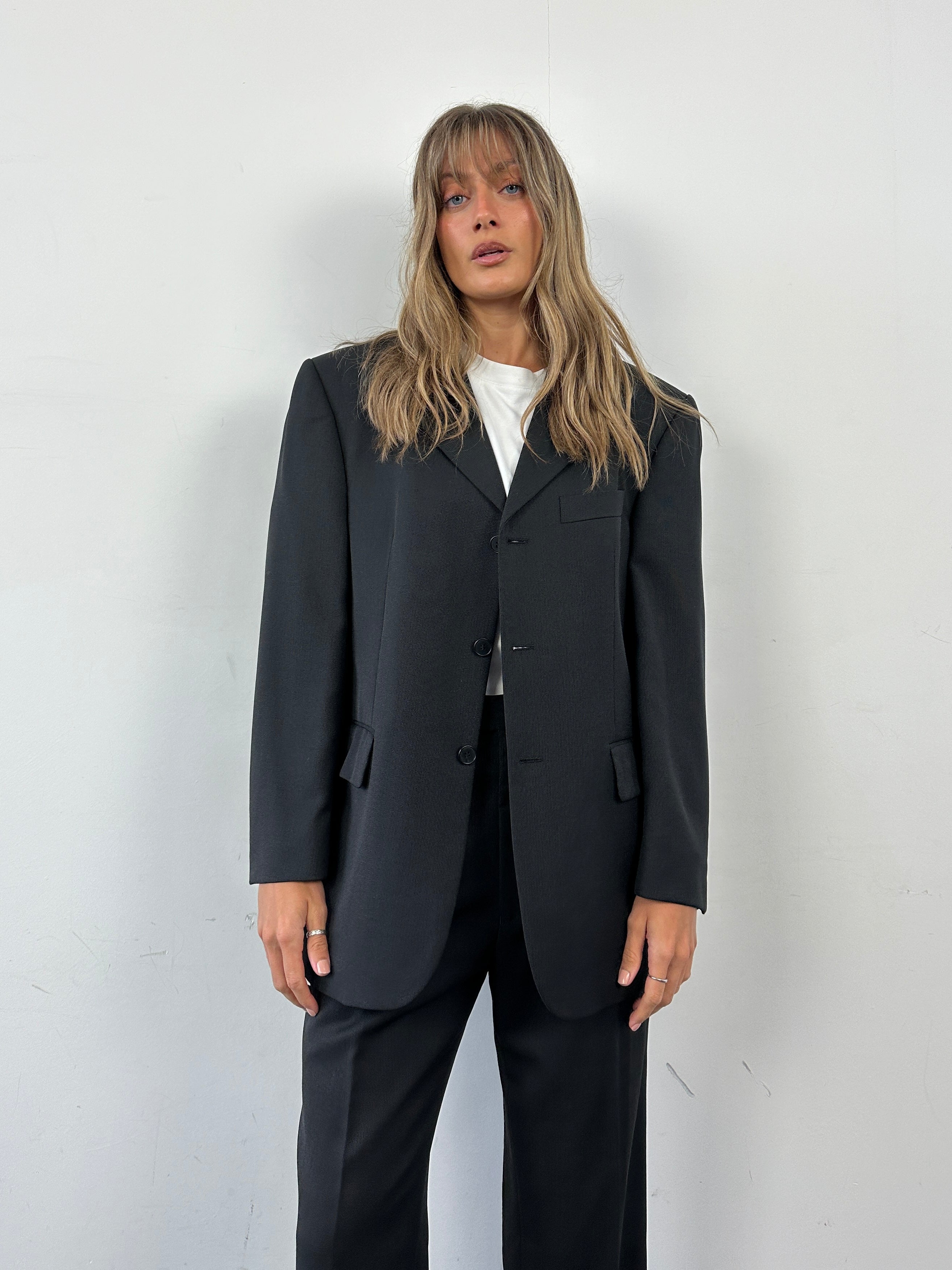 Pierre Cardin wool single-breasted suit jumpsuit in size 40S/W30, tailored fit, professional style, with classic lapel details.