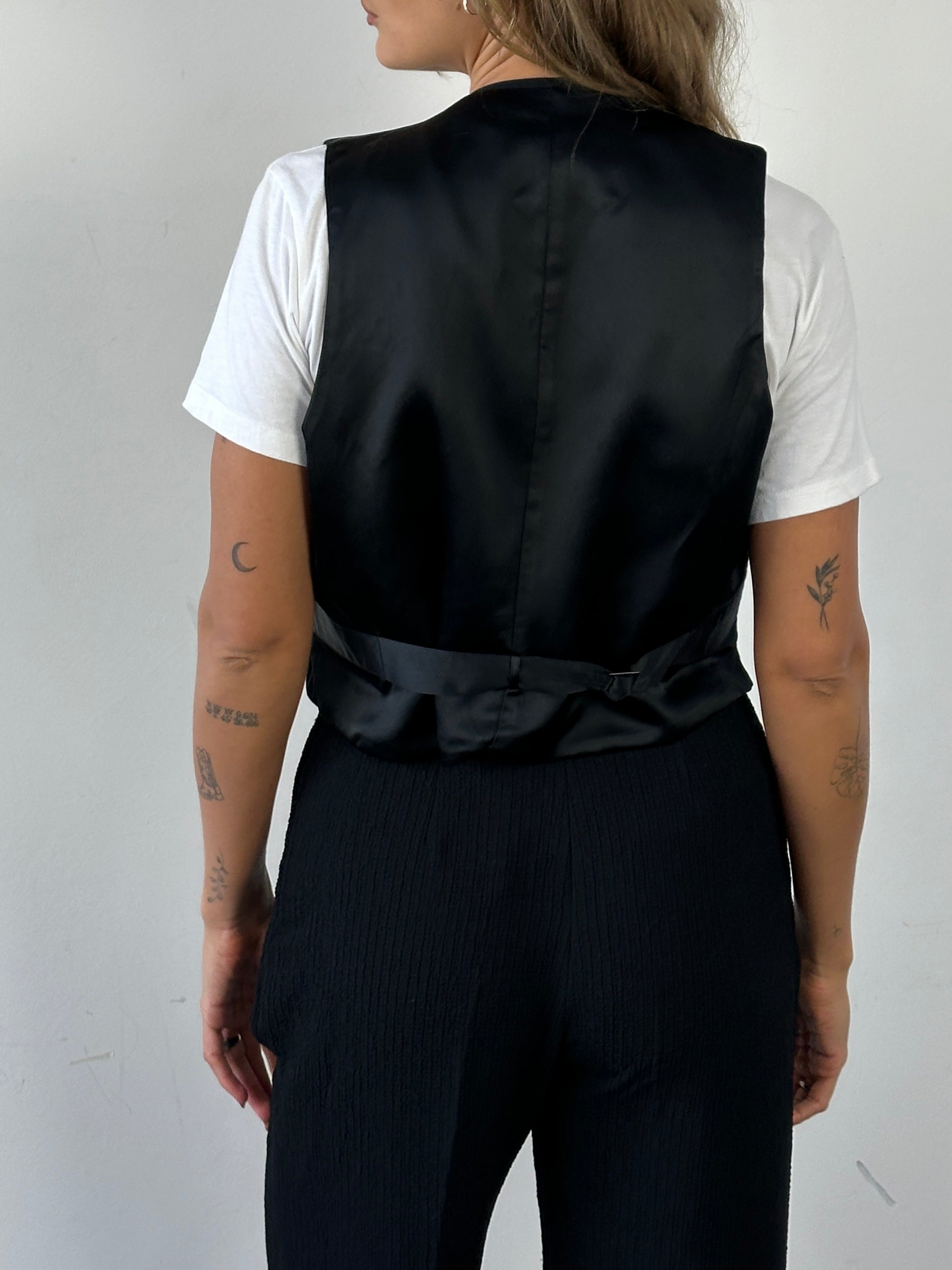 Vintage brand men's vintage tuxedo wool waistcoat, tailored coat with classic design, size M, detailed fabric texture.