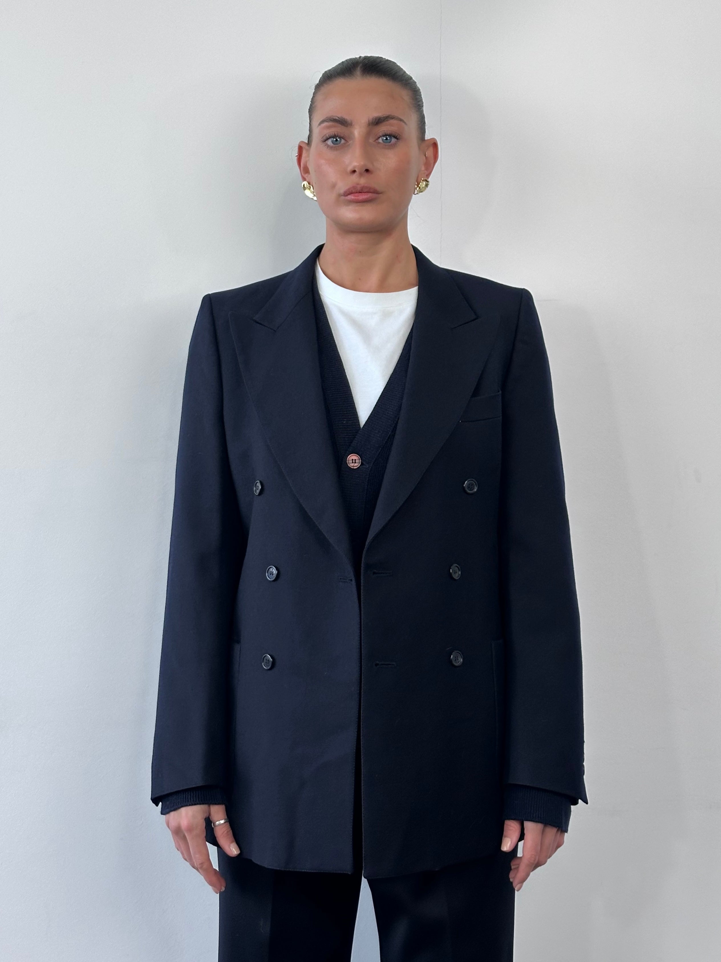 Vintage Italian vintage pure wool double-breasted blazer in size M, tailored fit with classic lapels and button details.