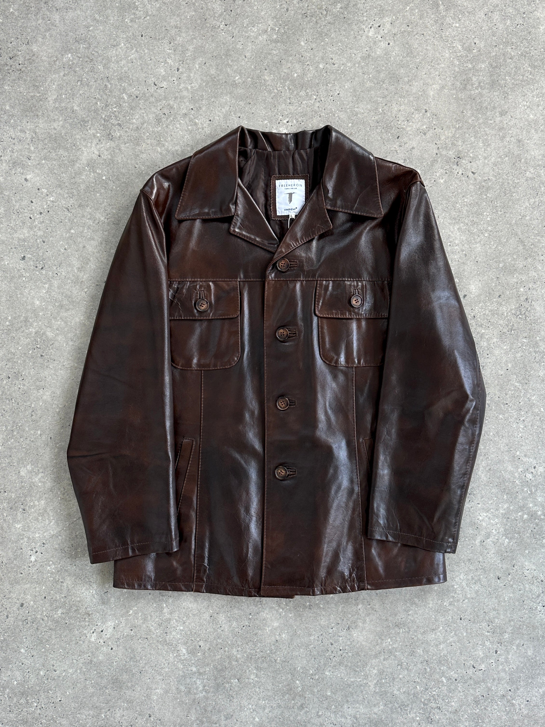 Conbipel boxy leather jacket in size L, featuring a stylish design and smooth black leather material.