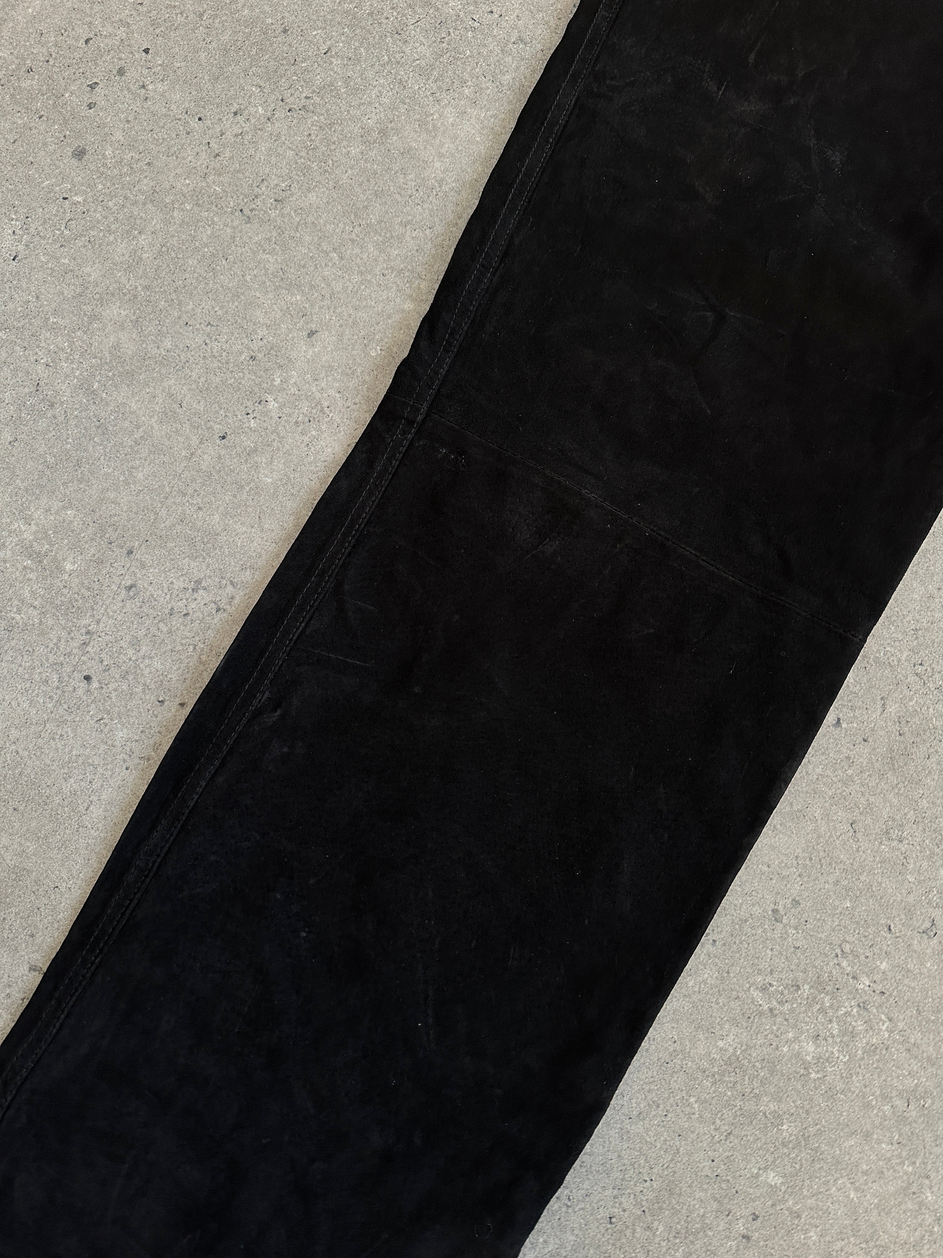 Vintage high waisted suede trousers in W26, featuring a classic fit and soft texture, displayed on a neutral background.