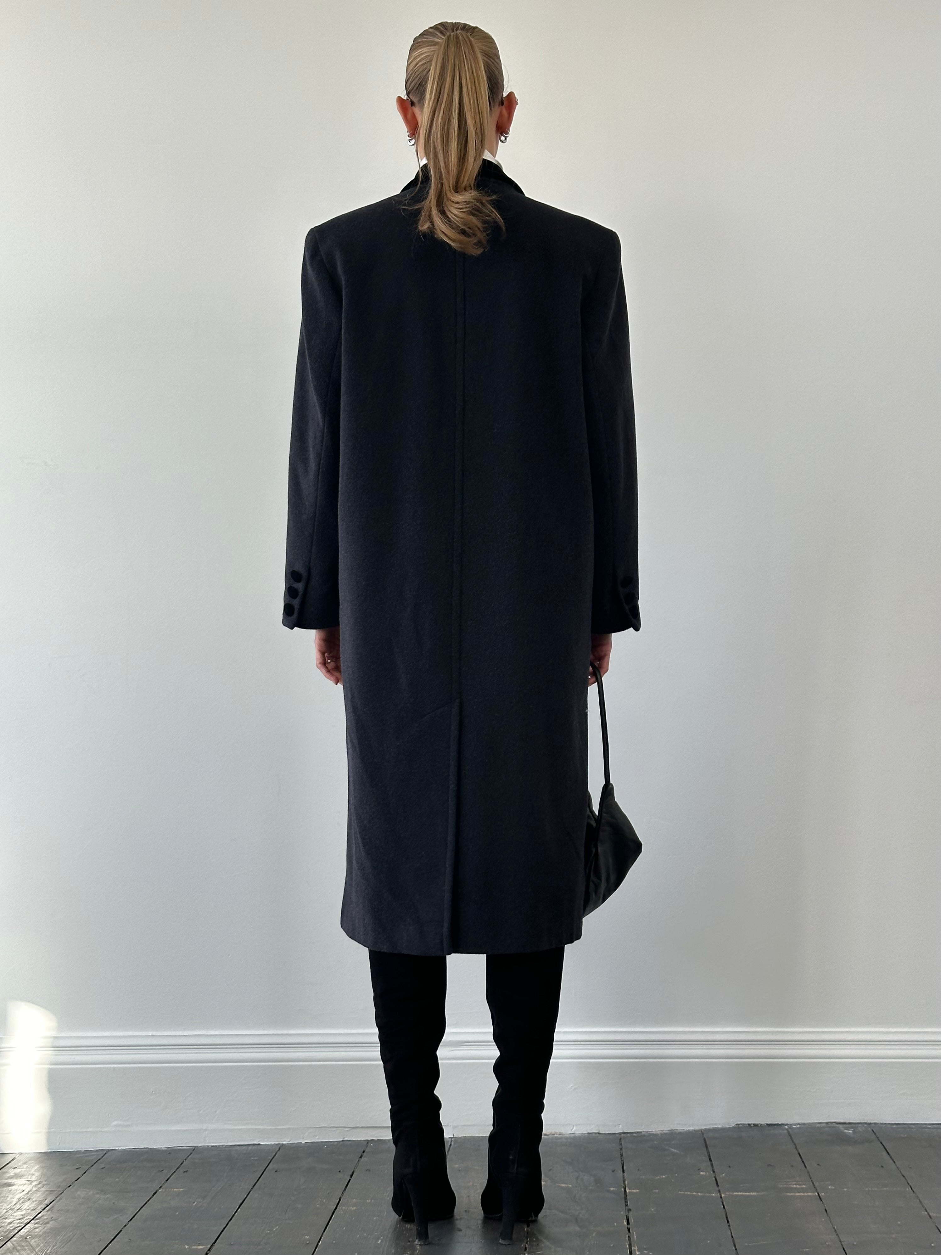 Vintage wool tuxedo double-breasted coat in XL, classic style with tailored fit, shown hanging on a wooden background.