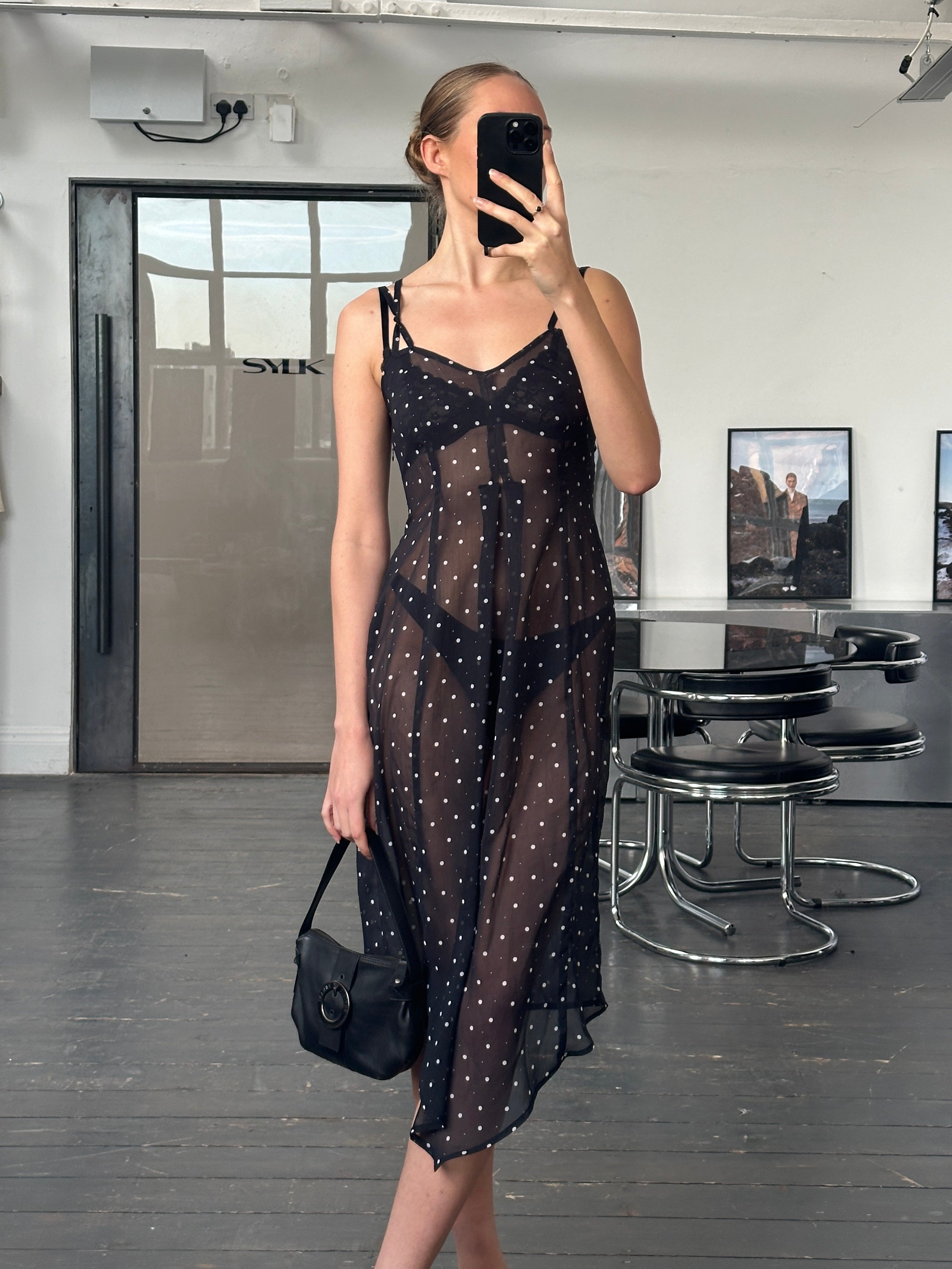 Vintage 2000s sheer polka dot slip dress in size S, featuring lightweight fabric and retro style with delicate dot pattern.