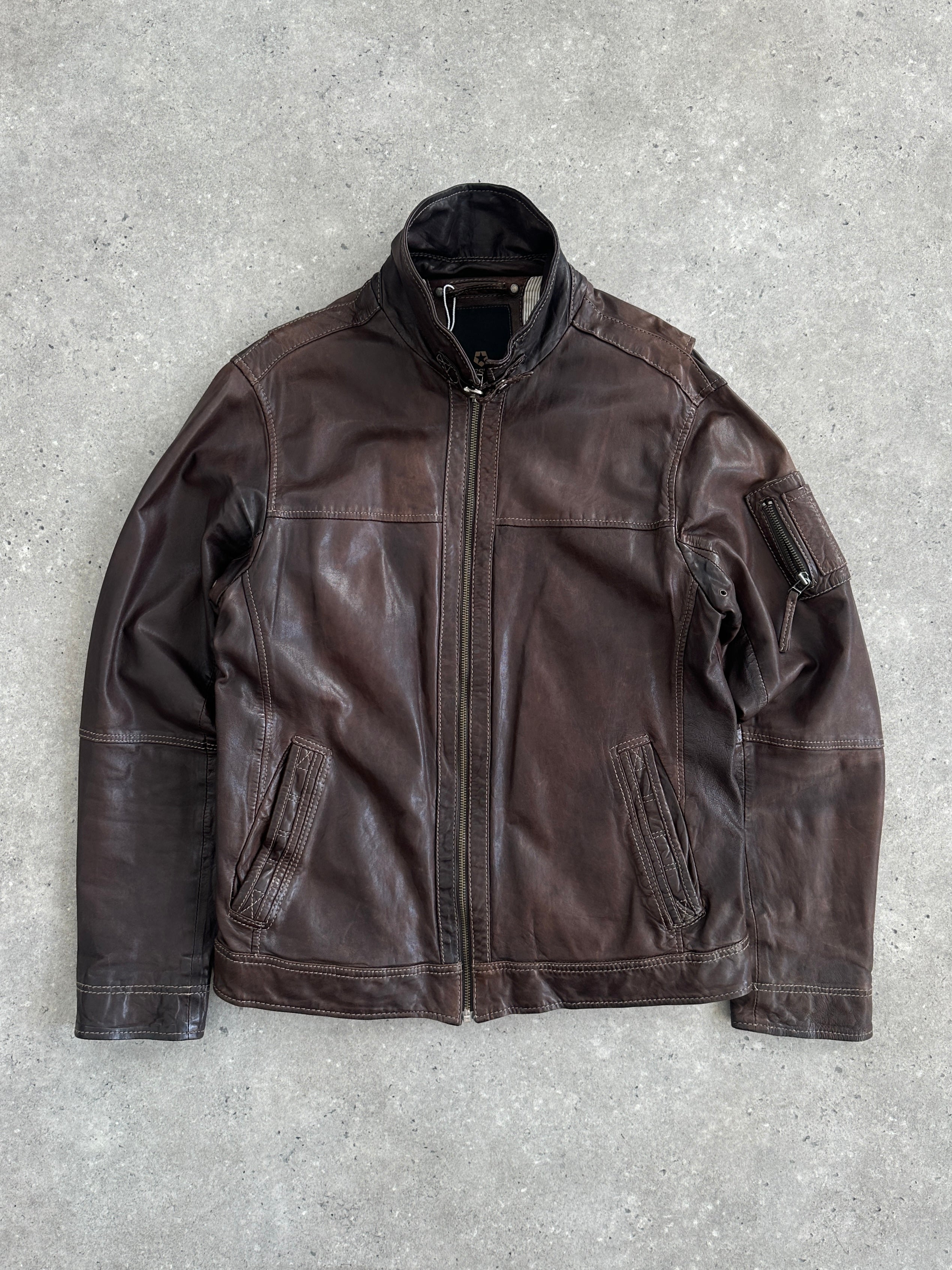 Vintage Moto aged leather jacket in size large, featuring classic design and distressed leather for a rugged, vintage look.