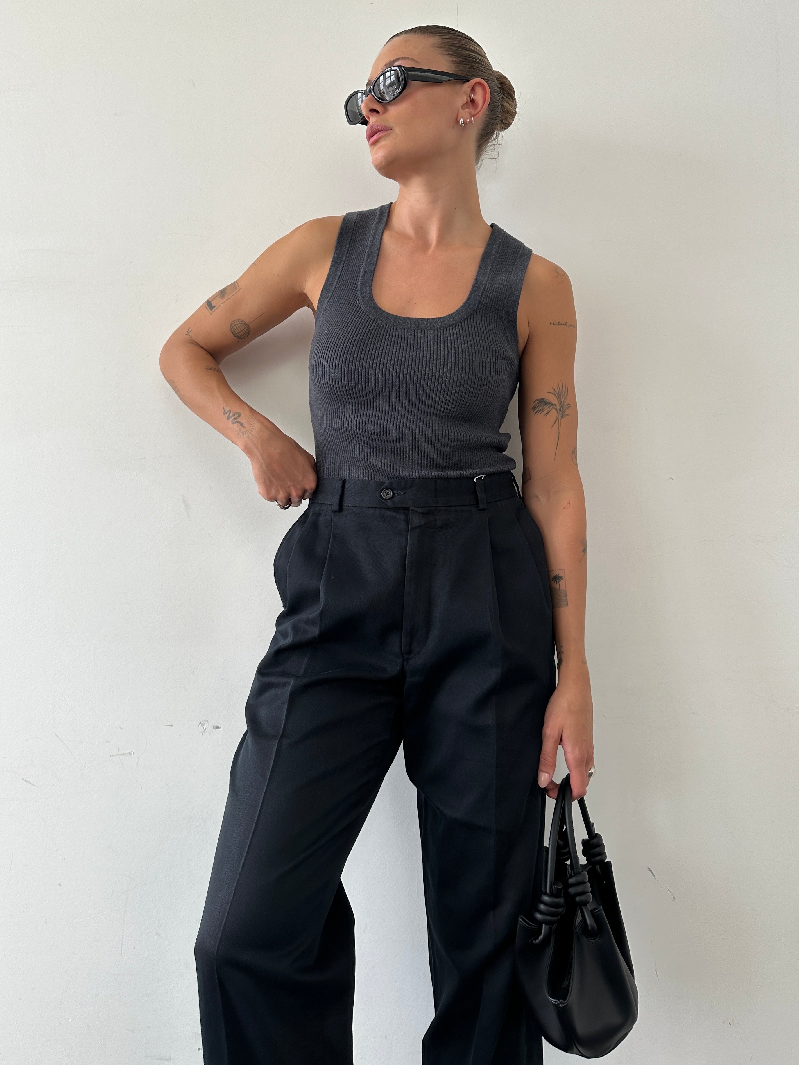 Vintage high waisted pleated trousers made from Pima cotton, featuring a classic fit and W32 waist, displayed on a neutral background.