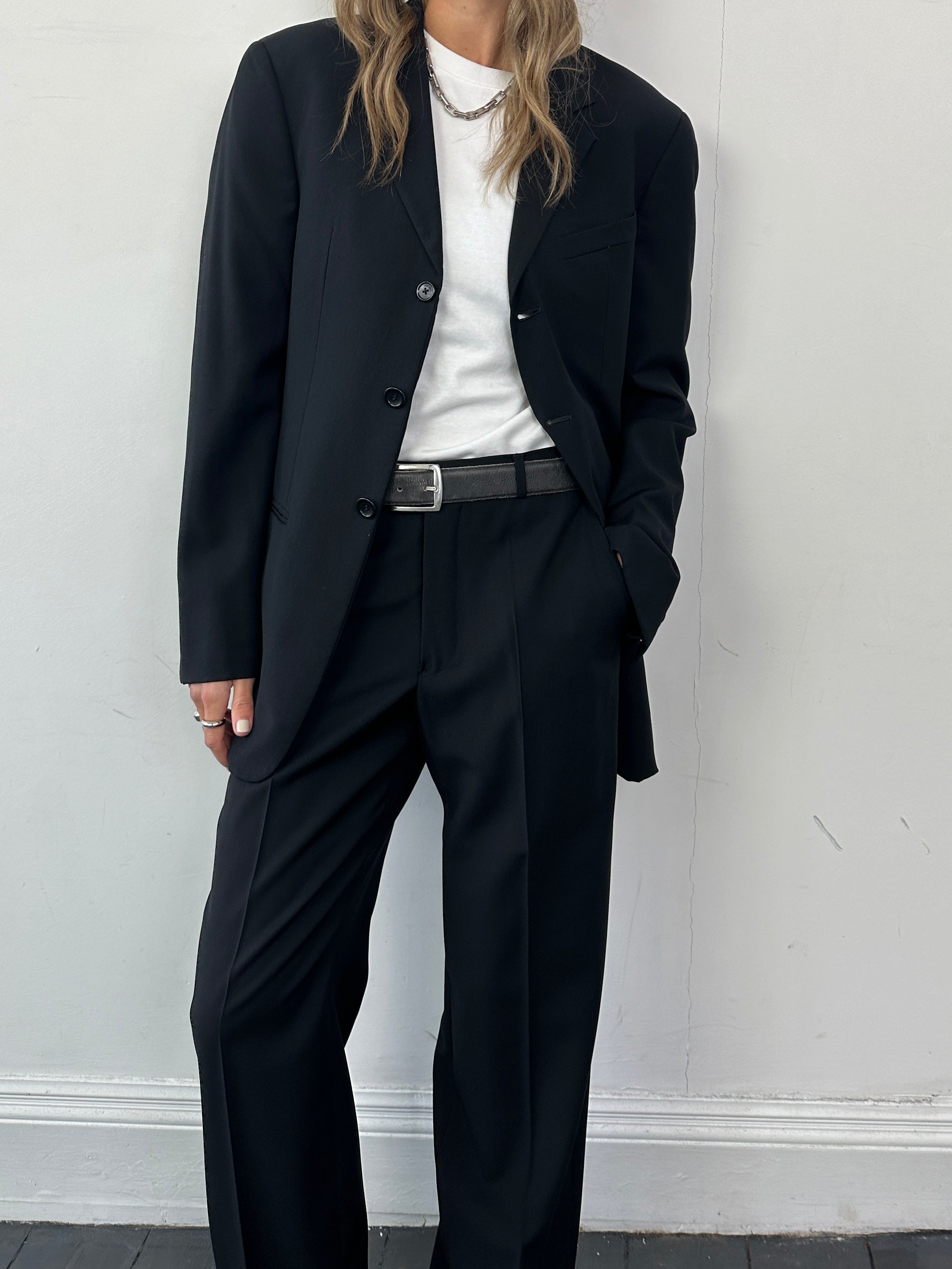 Armani Collezioni pure wool single-breasted suit jumpsuit in size 38R/W30, tailored with a classic lapel and sleek fit.