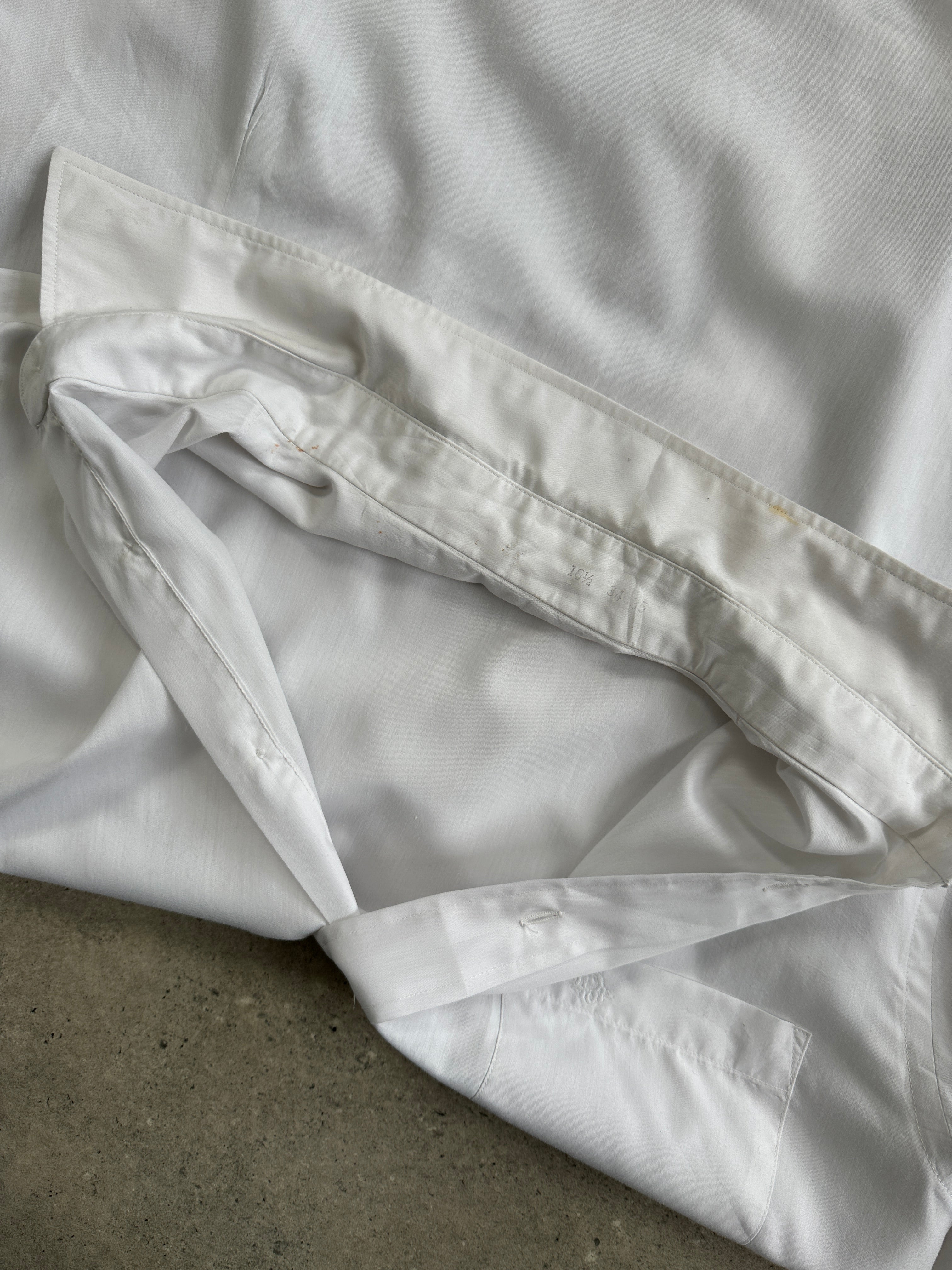 Christian Dior cotton logo shirt in size L, featuring a classic design with the Dior brand logo on the front.