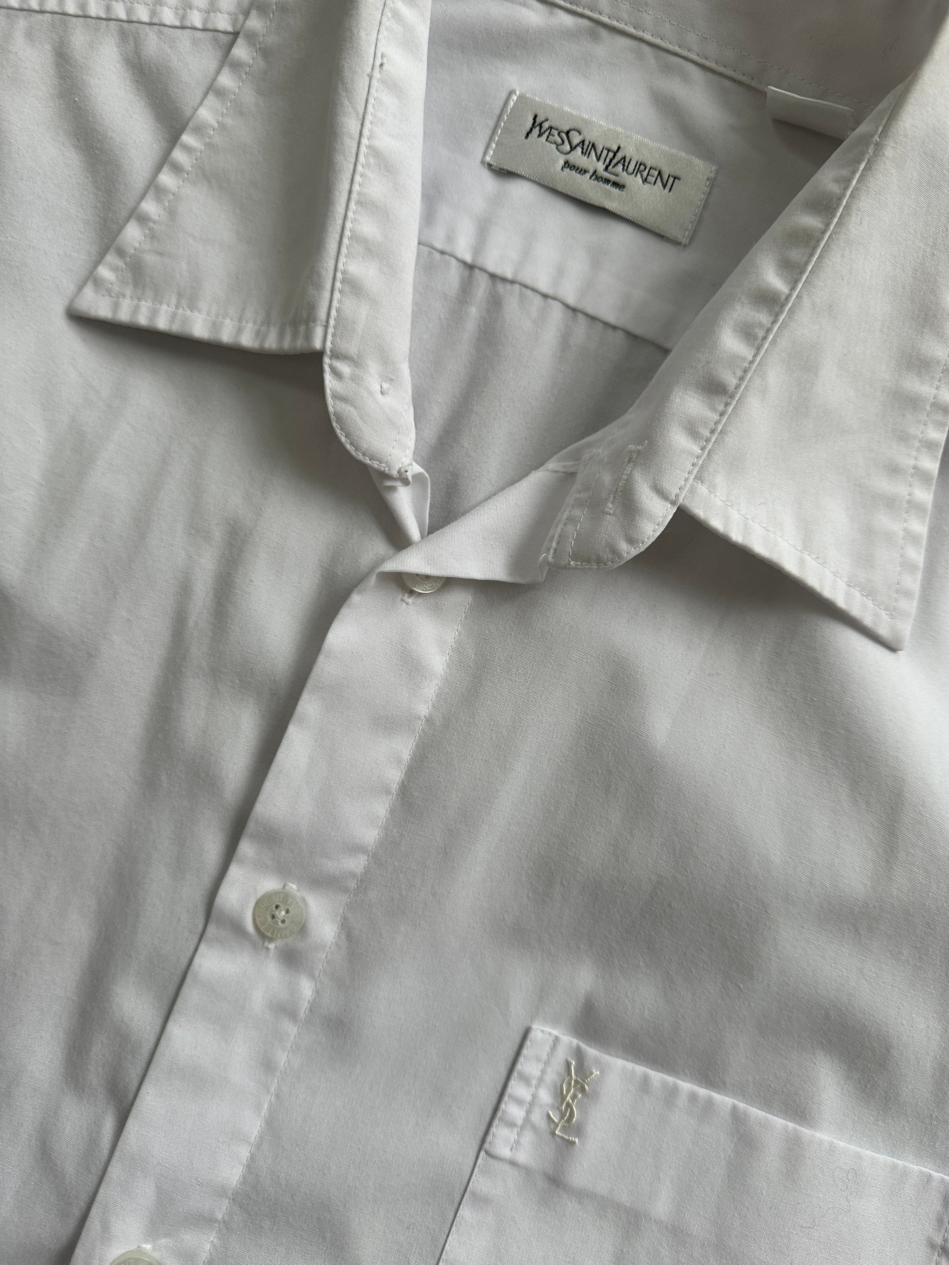 Yves Saint Laurent Pour Homme cotton short sleeve logo shirt in size L, featuring a classic design with the brand's logo on the chest.