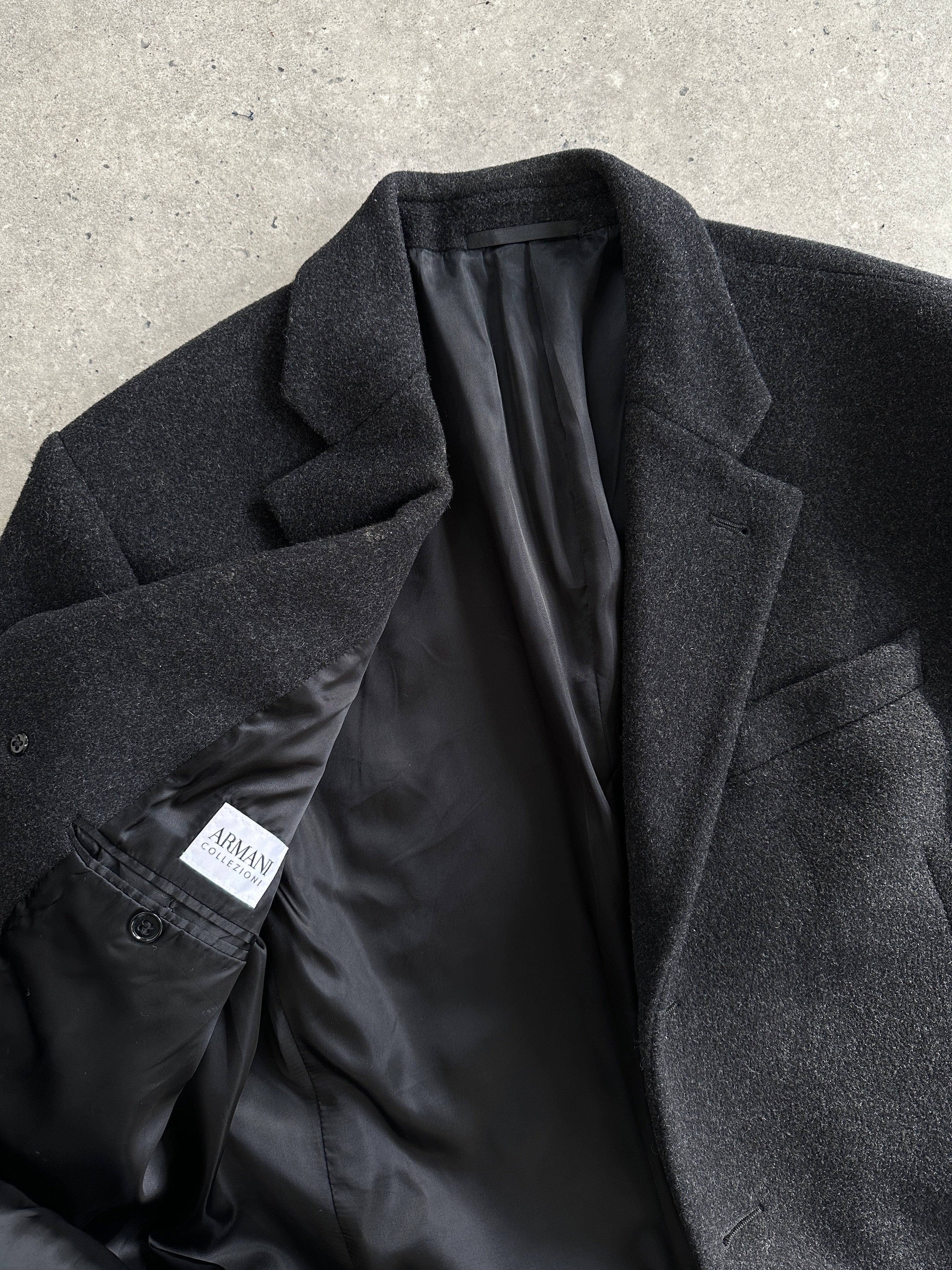 Armani Collezioni wool cashmere single-breasted coat in size L/XL, shown in a stylish, tailored design with a classic collar.