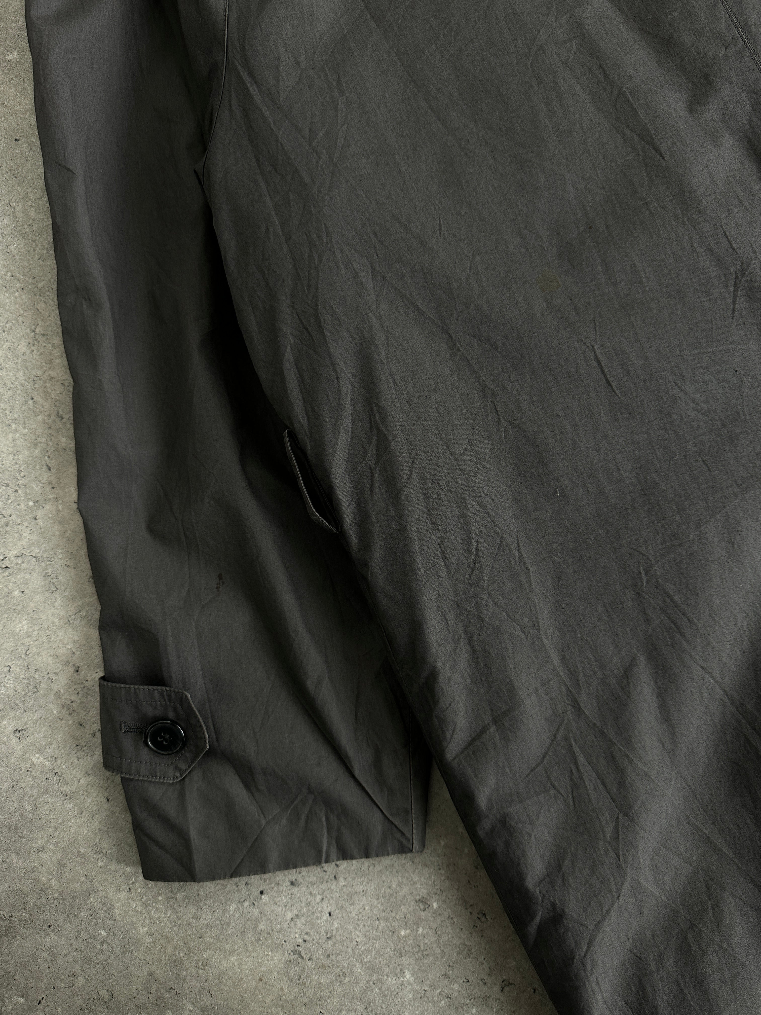 Yves Saint Laurent Pour Homme pure cotton trench coat with concealed placket in size M/L, showing the classic design and fabric detail.