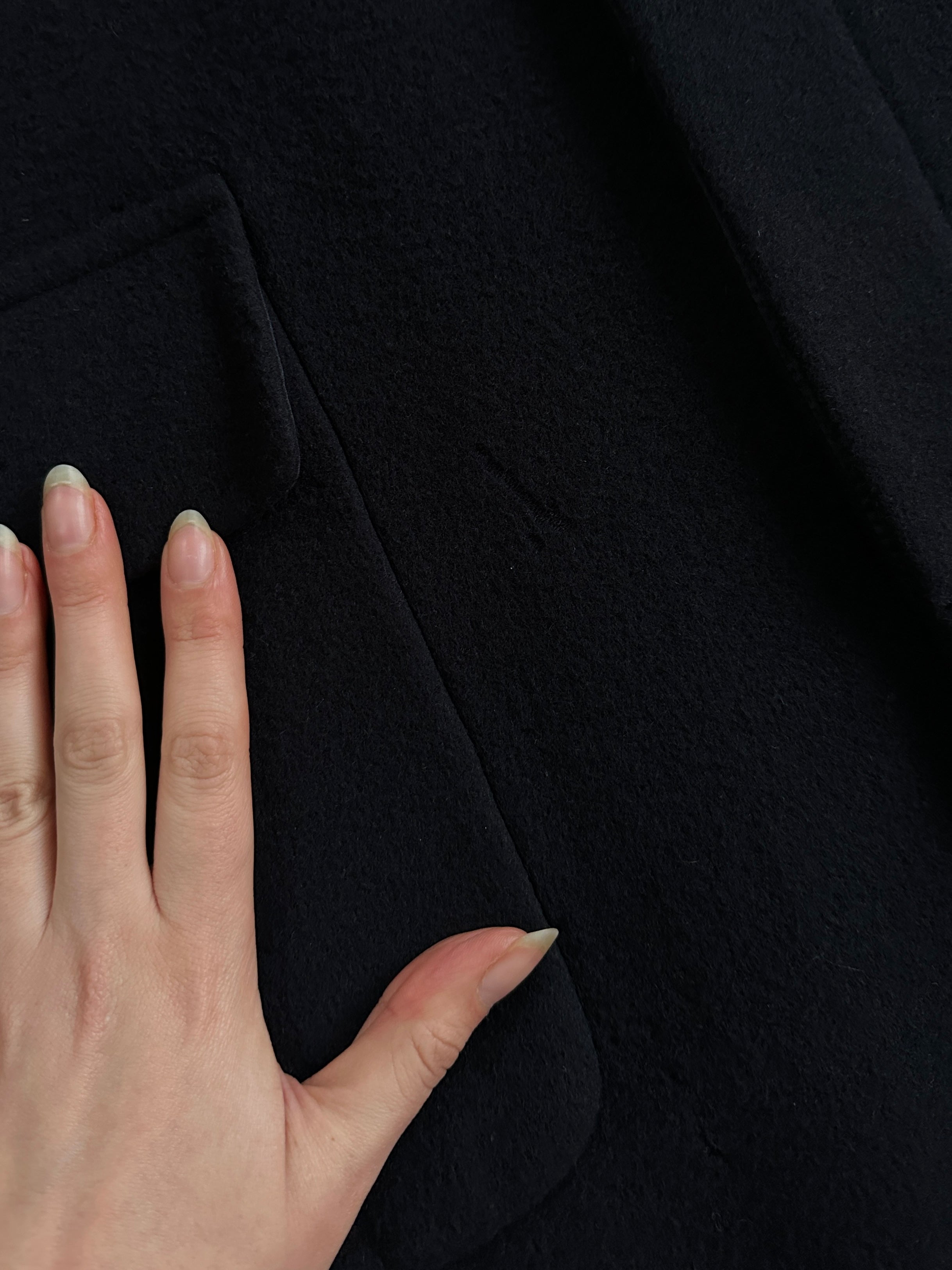 Vintage 1990s wool single-breasted coat in XL/XXL, classic vintage coat with button closure and tailored fit, front view.