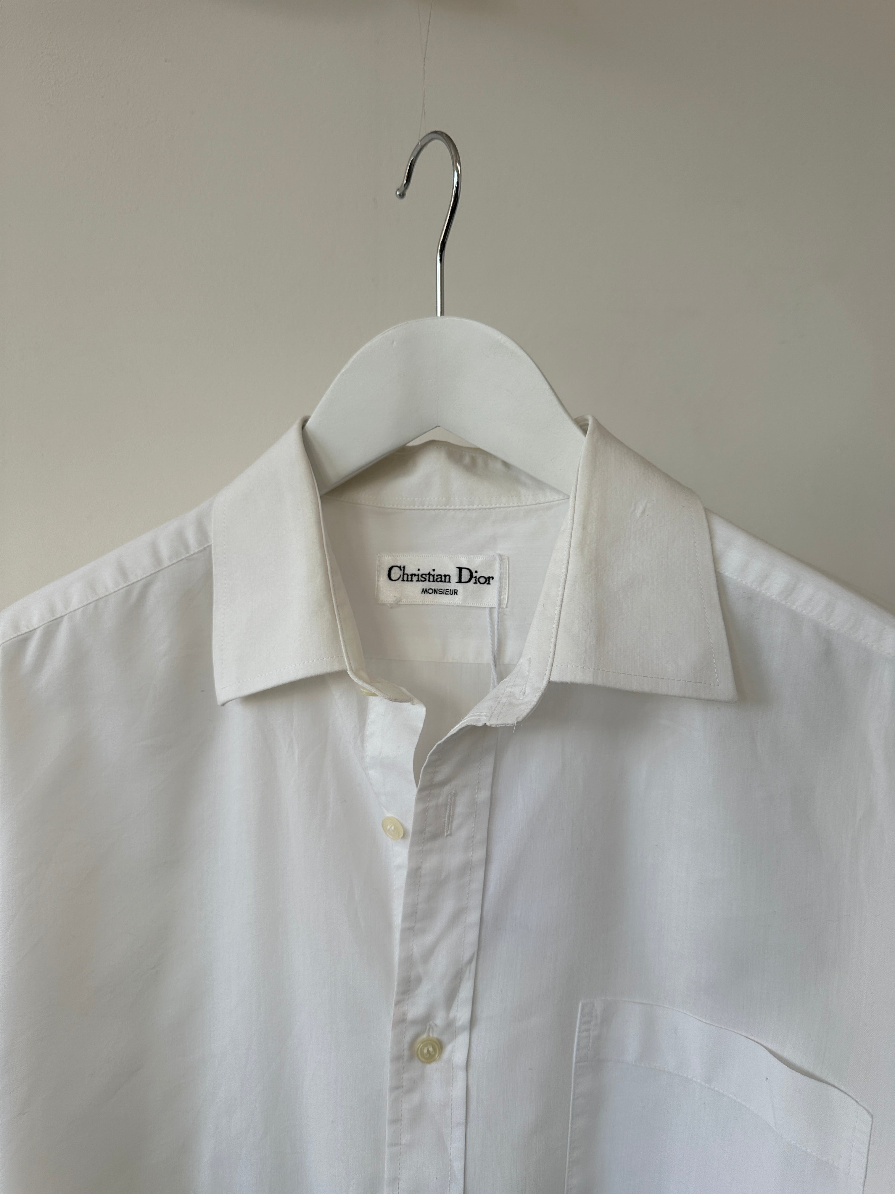 Christian Dior cotton logo shirt in size M/L, featuring the iconic Dior logo on a classic white cotton shirt.