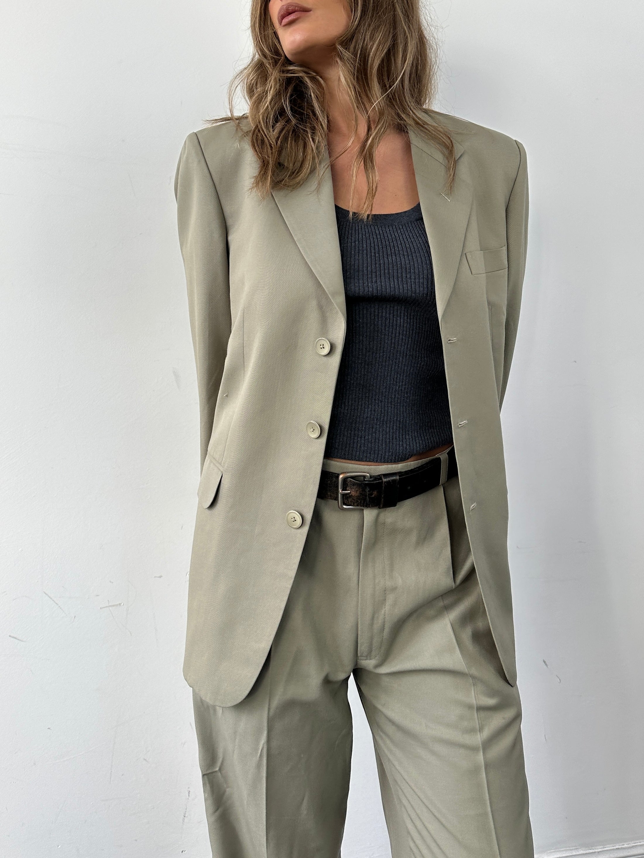 Vintage wool single-breasted suit jumpsuit in size 40R/W30, tailored with classic lapels and a structured fit.