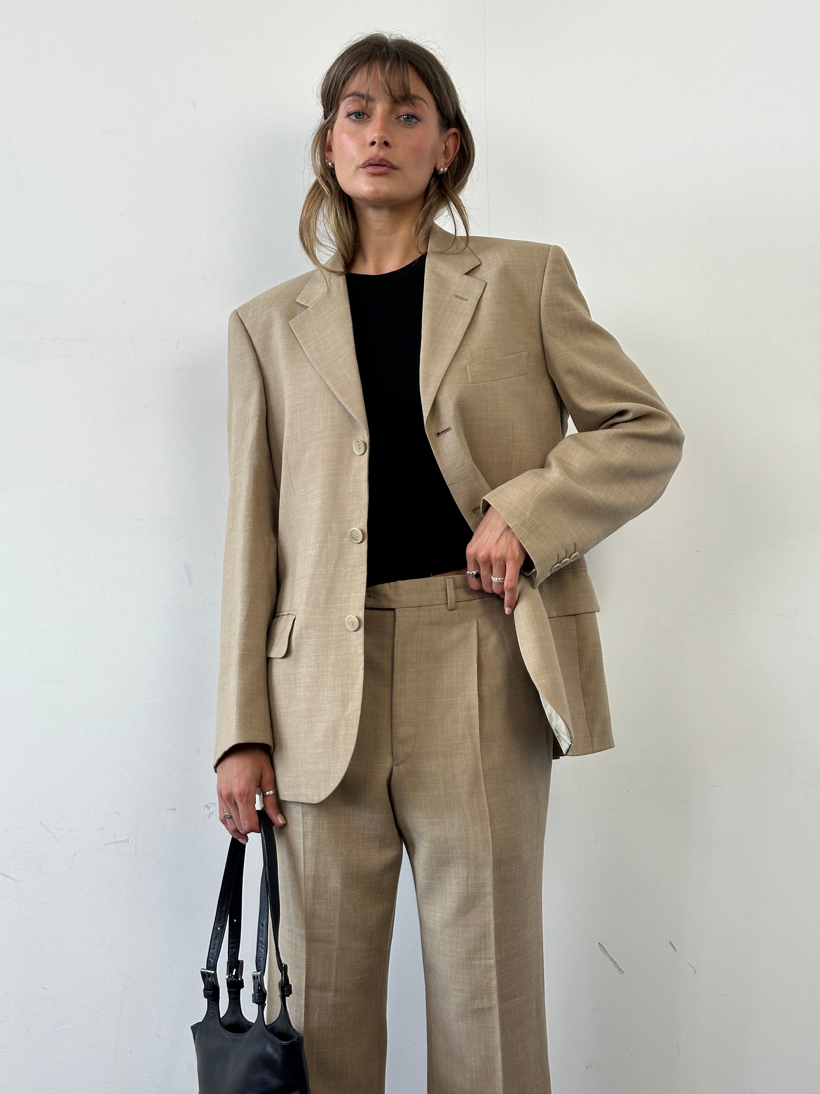 Vintage single-breasted wool linen blend suit jumpsuit in size 36R/W31, featuring tailored lapels and classic style.
