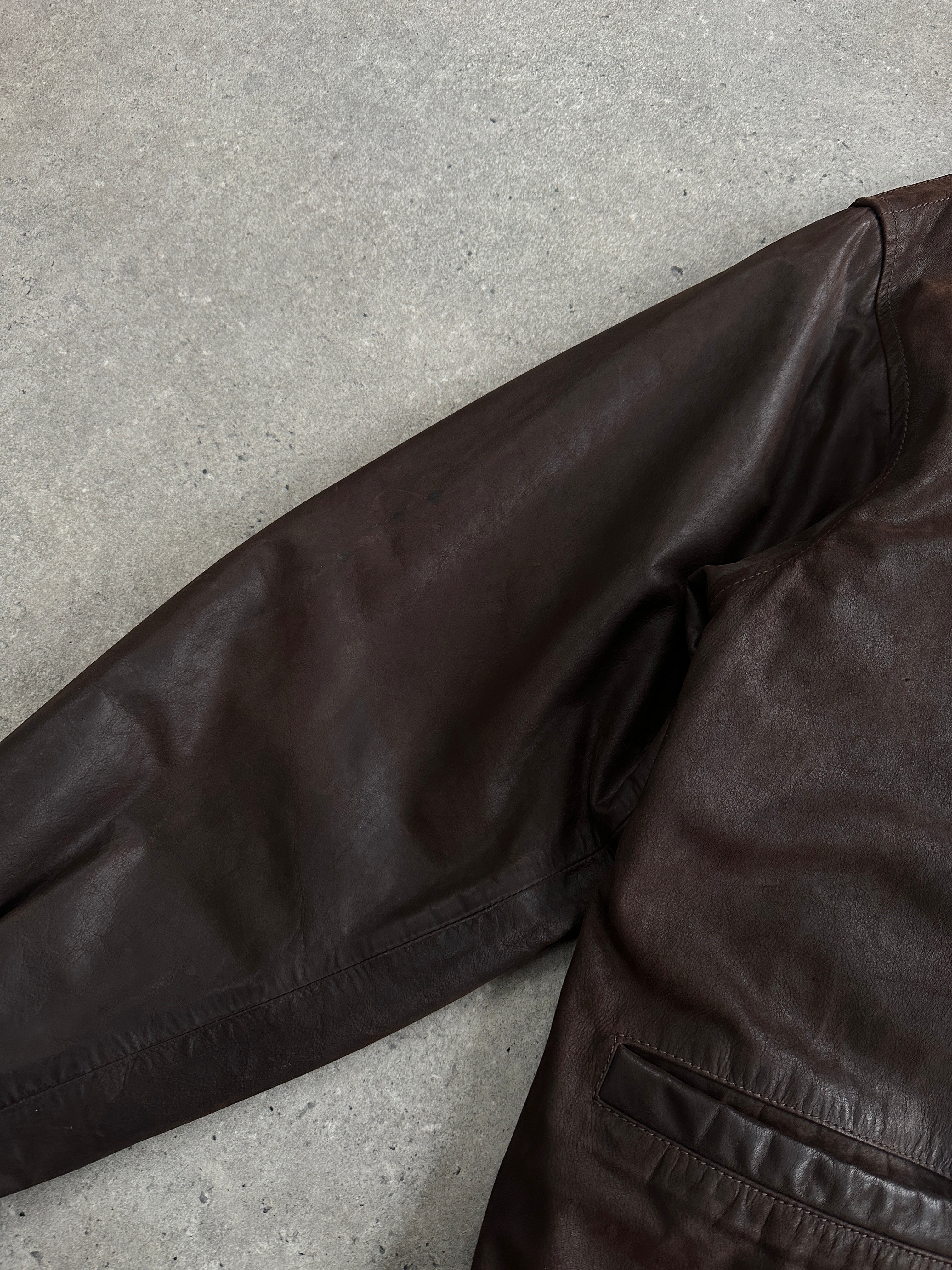 Versace Jeans Couture 1990s boxy leather jacket in black, featuring classic design and premium leather material.