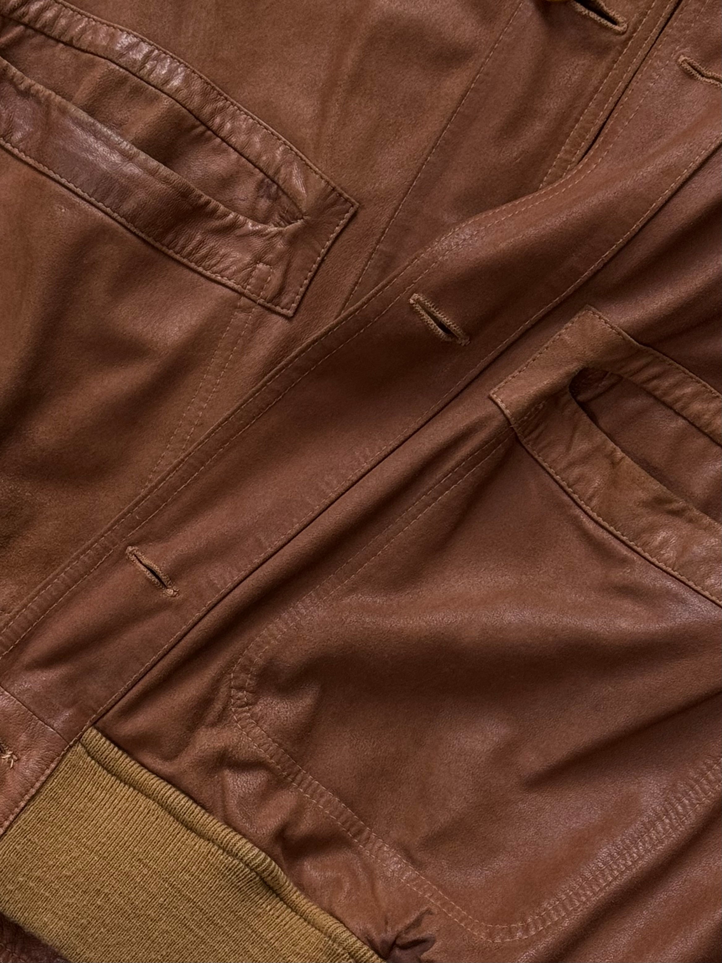 Vintage Italian 1980s reversible suede leather jacket, size large, with classic design and soft textured exterior.