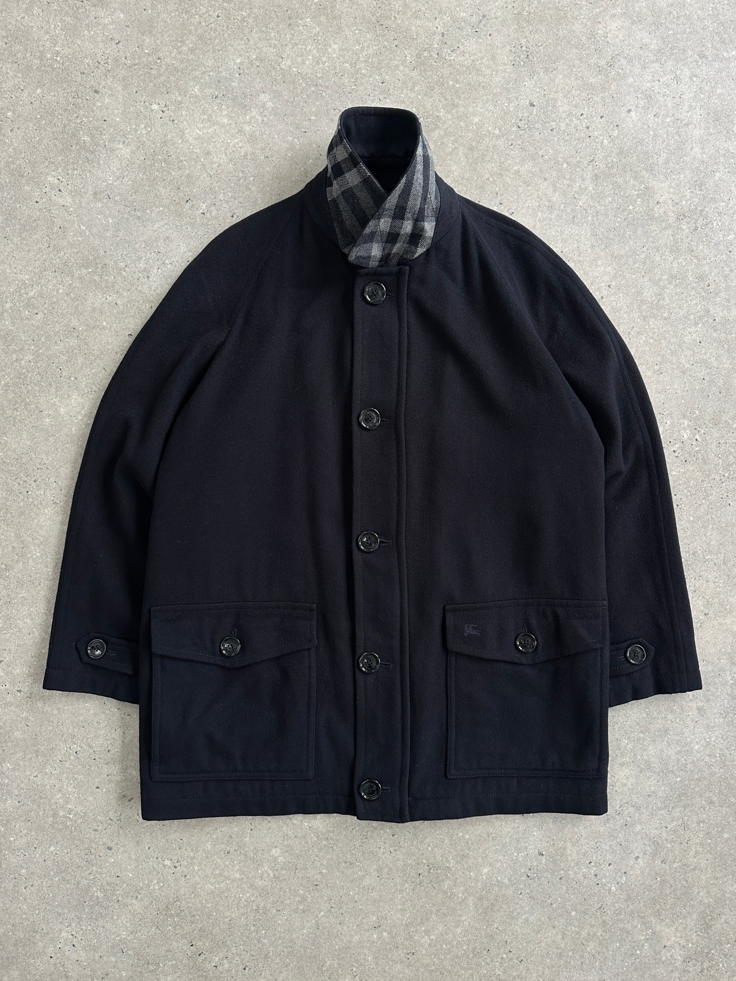 Burberry London 1990s wool single-breasted logo coat in size L/XL, featuring classic plaid pattern and tailored fit.