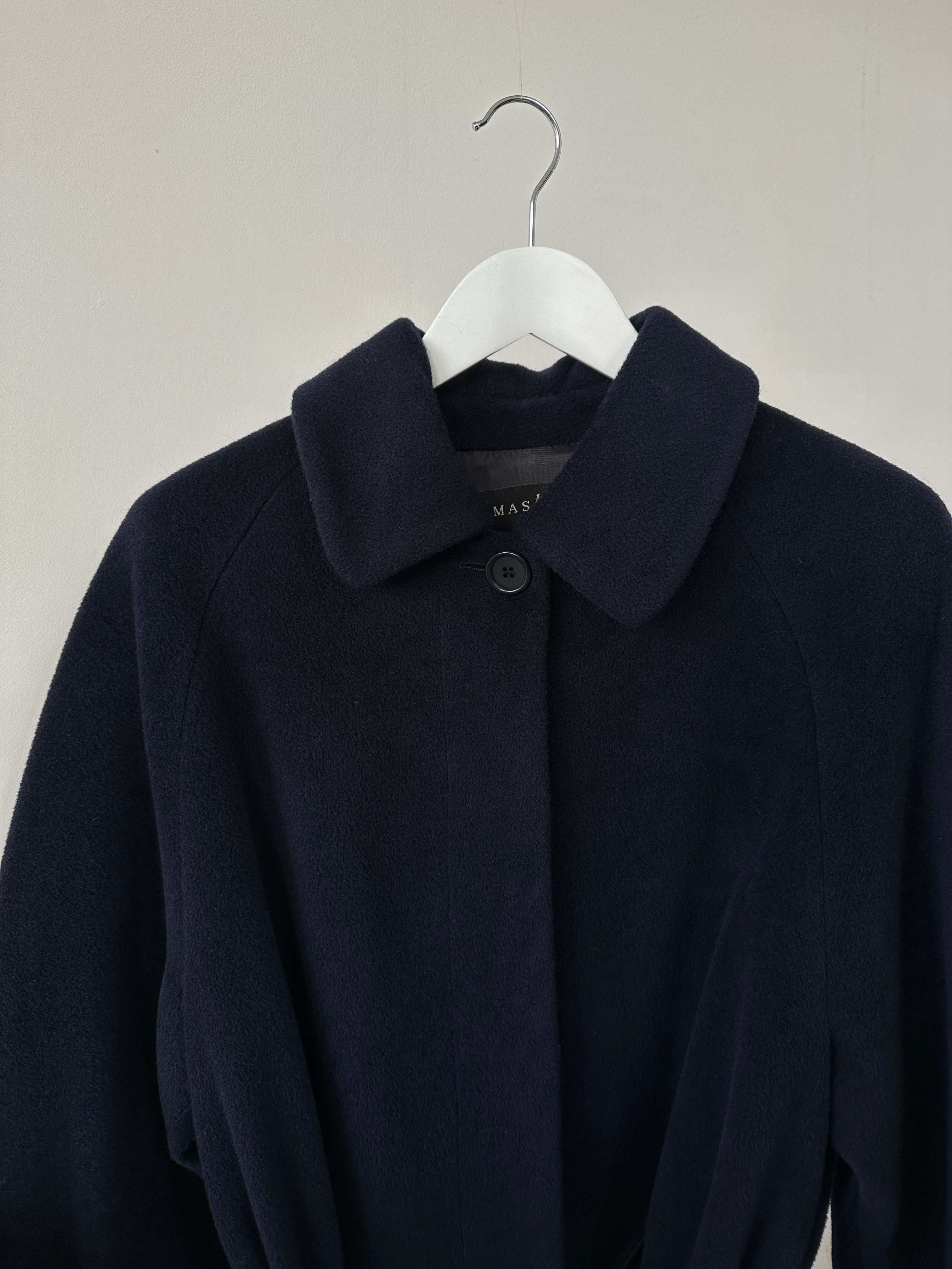 Vintage wool belted coat with concealed placket and single-breasted design in size L, showcasing a classic, textured fabric.