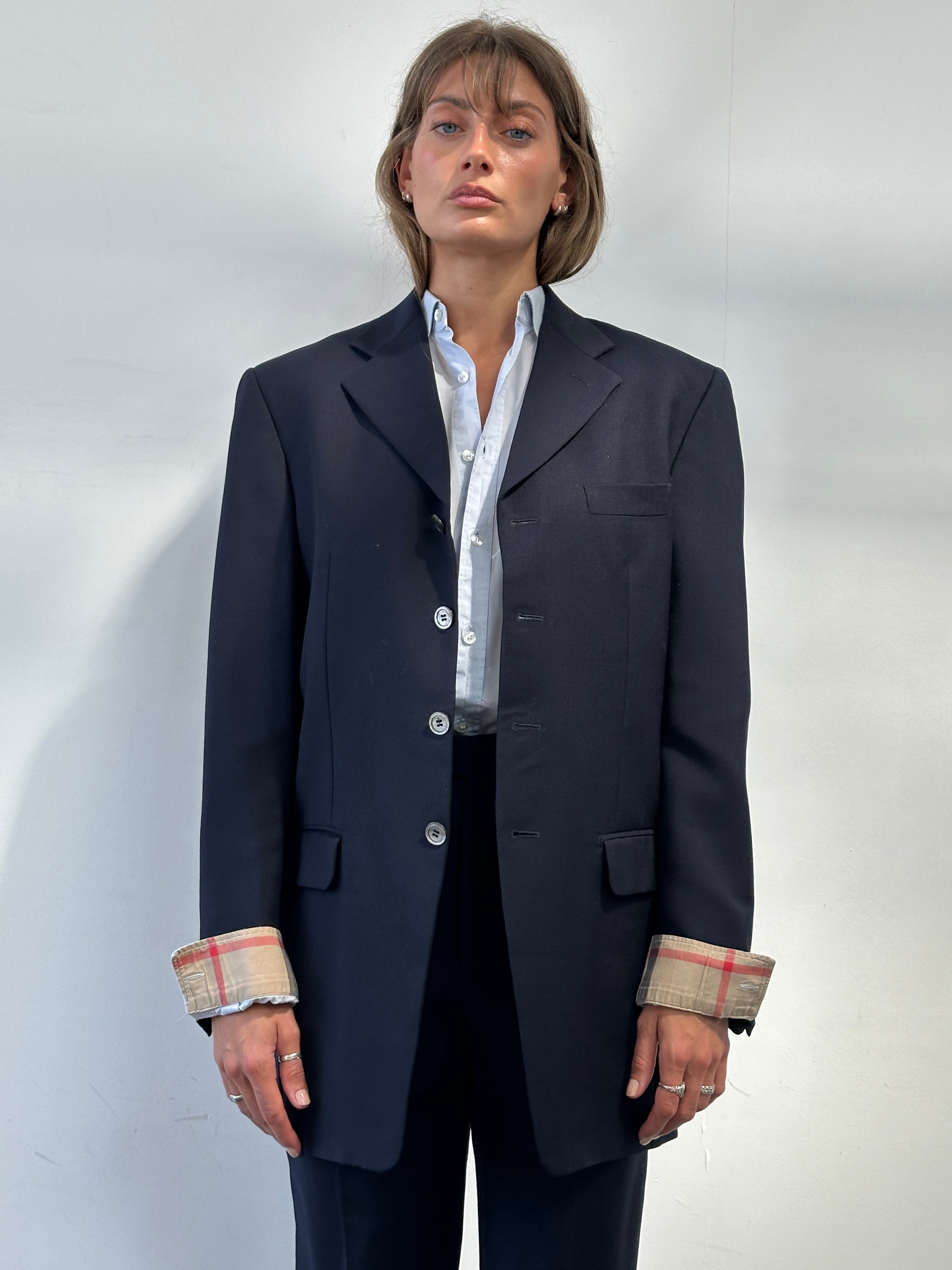 Yves Saint Laurent Pour Homme virgin wool mohair single-breasted suit in size 38R/W28, shown on a mannequin.