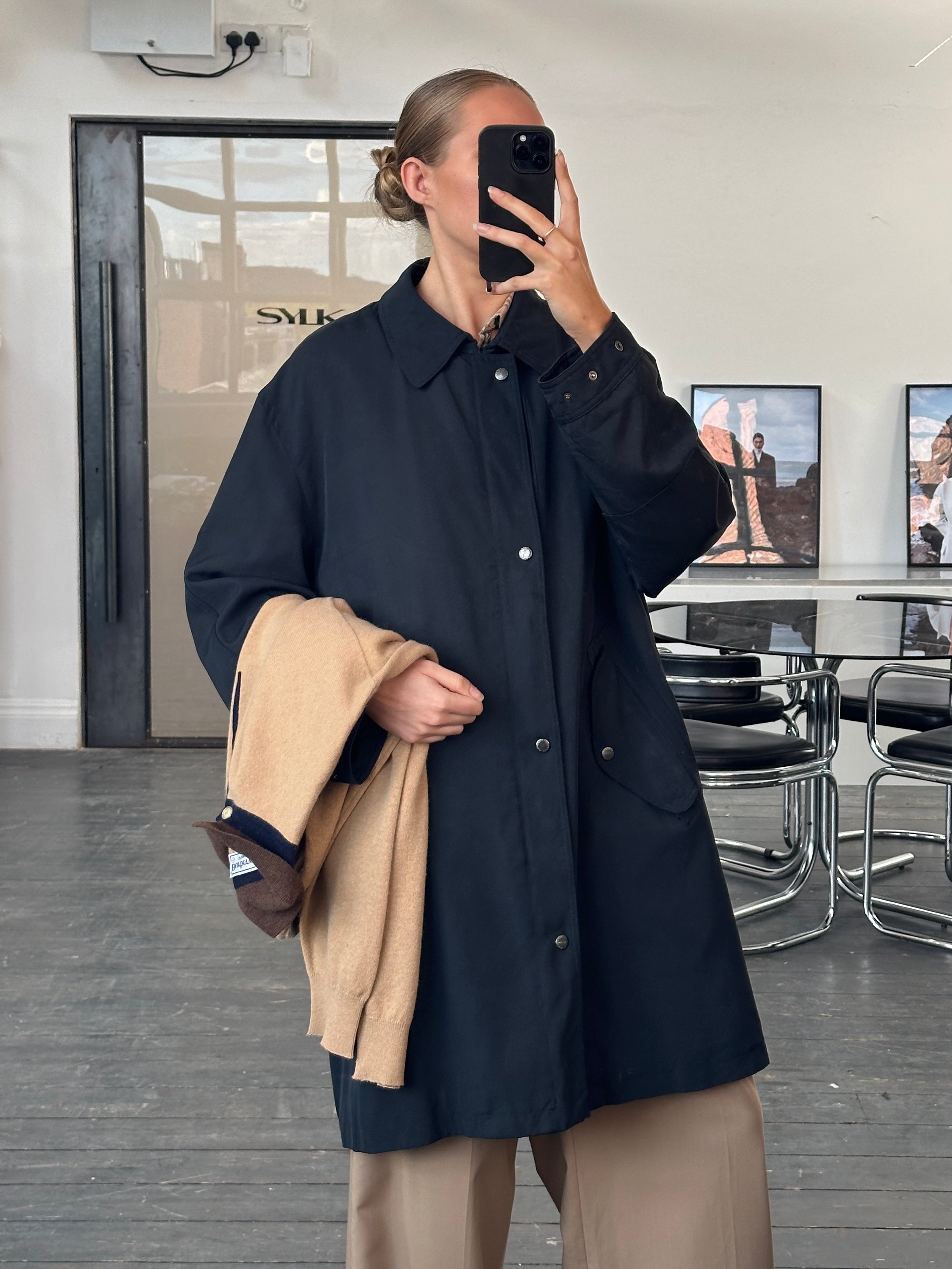 Burberry London 1990s waterproof Nova Check trench coat in XL/XXL, showcasing the classic check pattern and trench design.