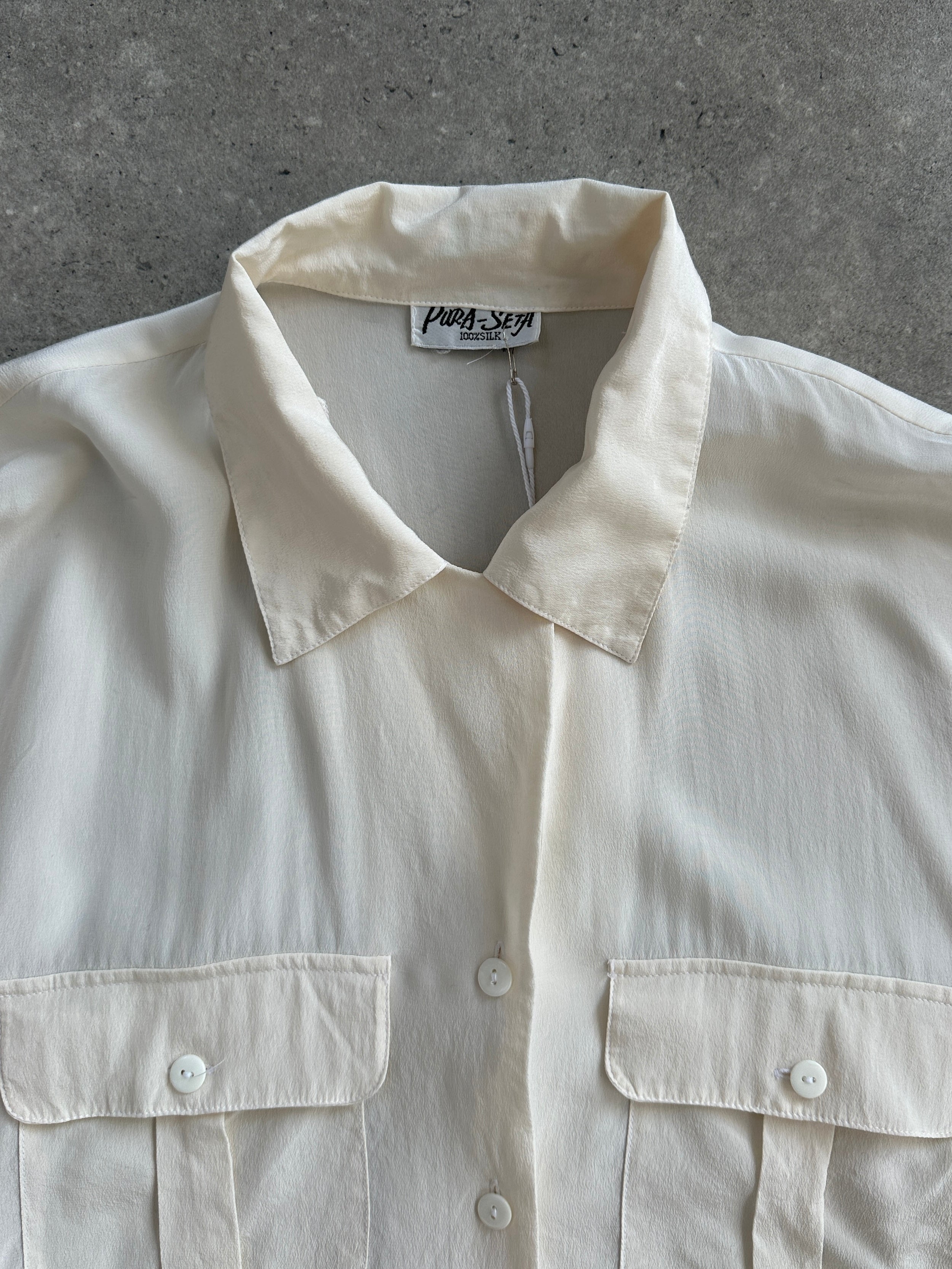 Vintage 1990s pure silk minimal shirt in size M, featuring a sleek design and smooth fabric.