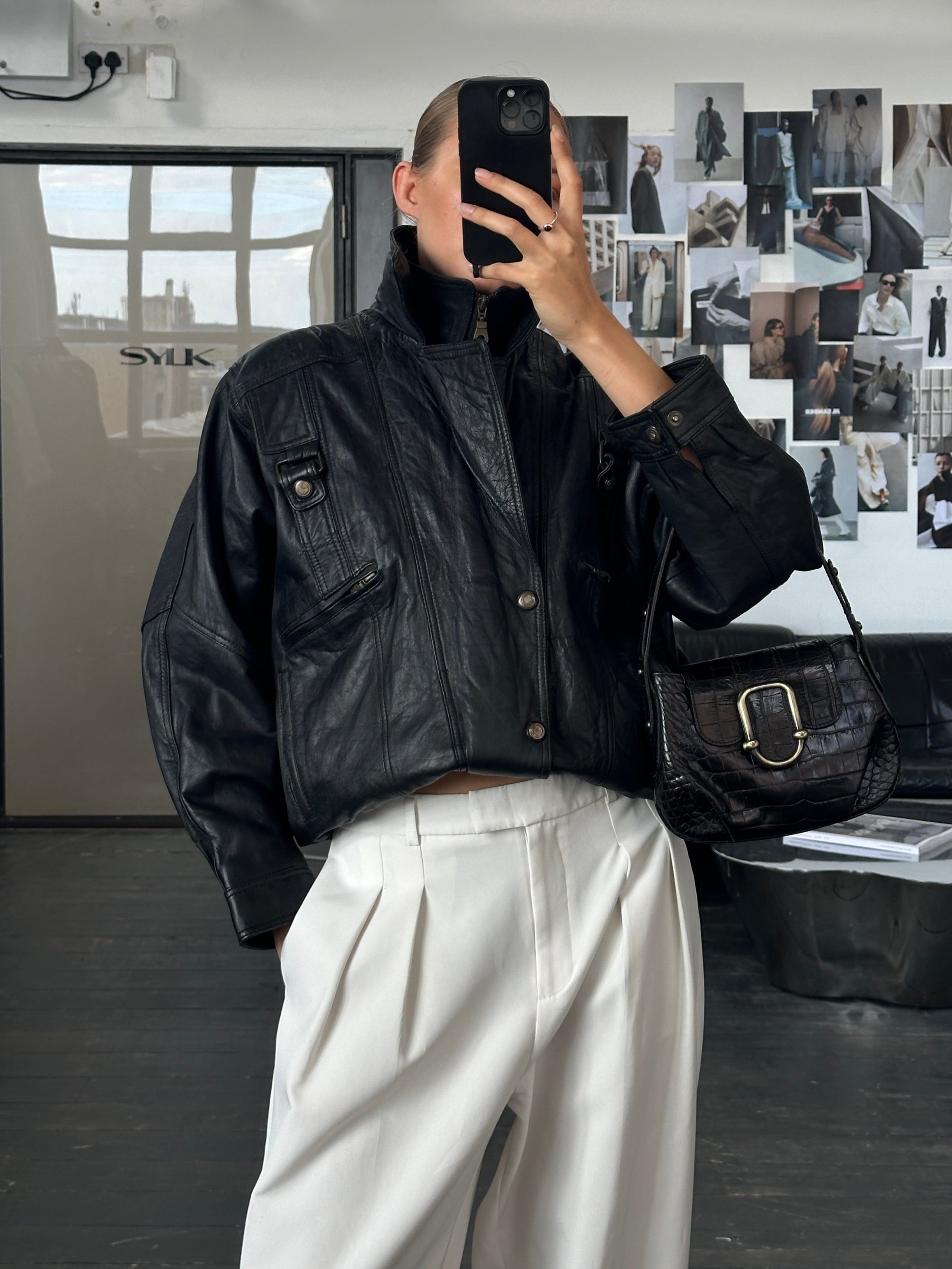 Vintage 1990s high neck leather bomber jacket in size M, featuring classic design and durable leather material.