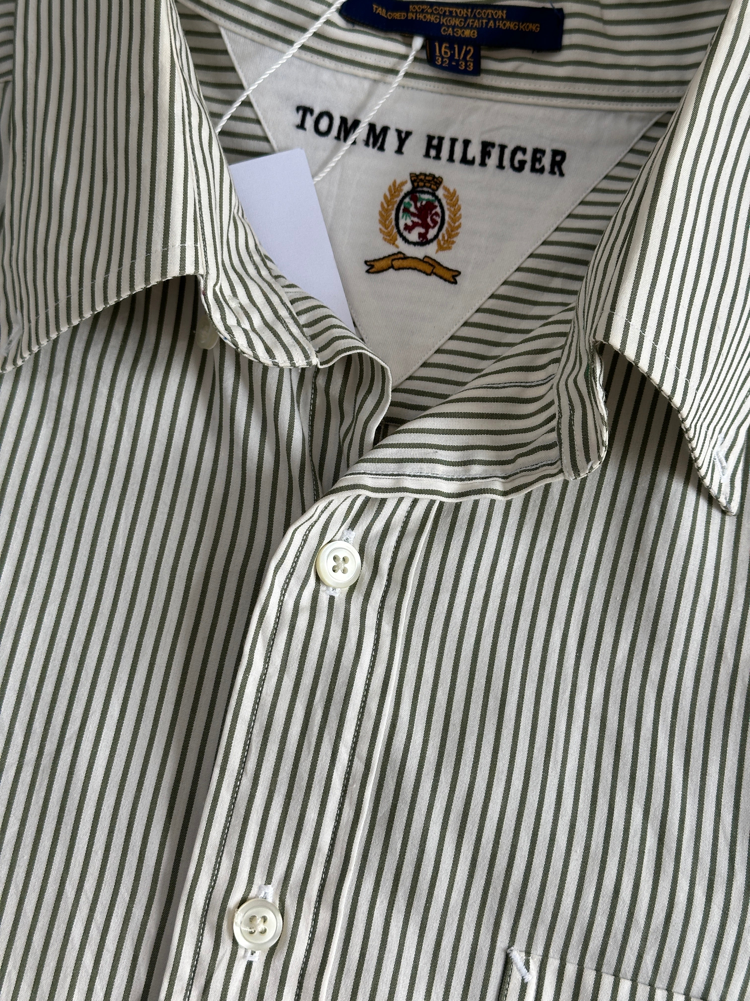 Tommy Hilfiger striped pure cotton shirt in size L, featuring a classic button-down design with a collar and long sleeves.