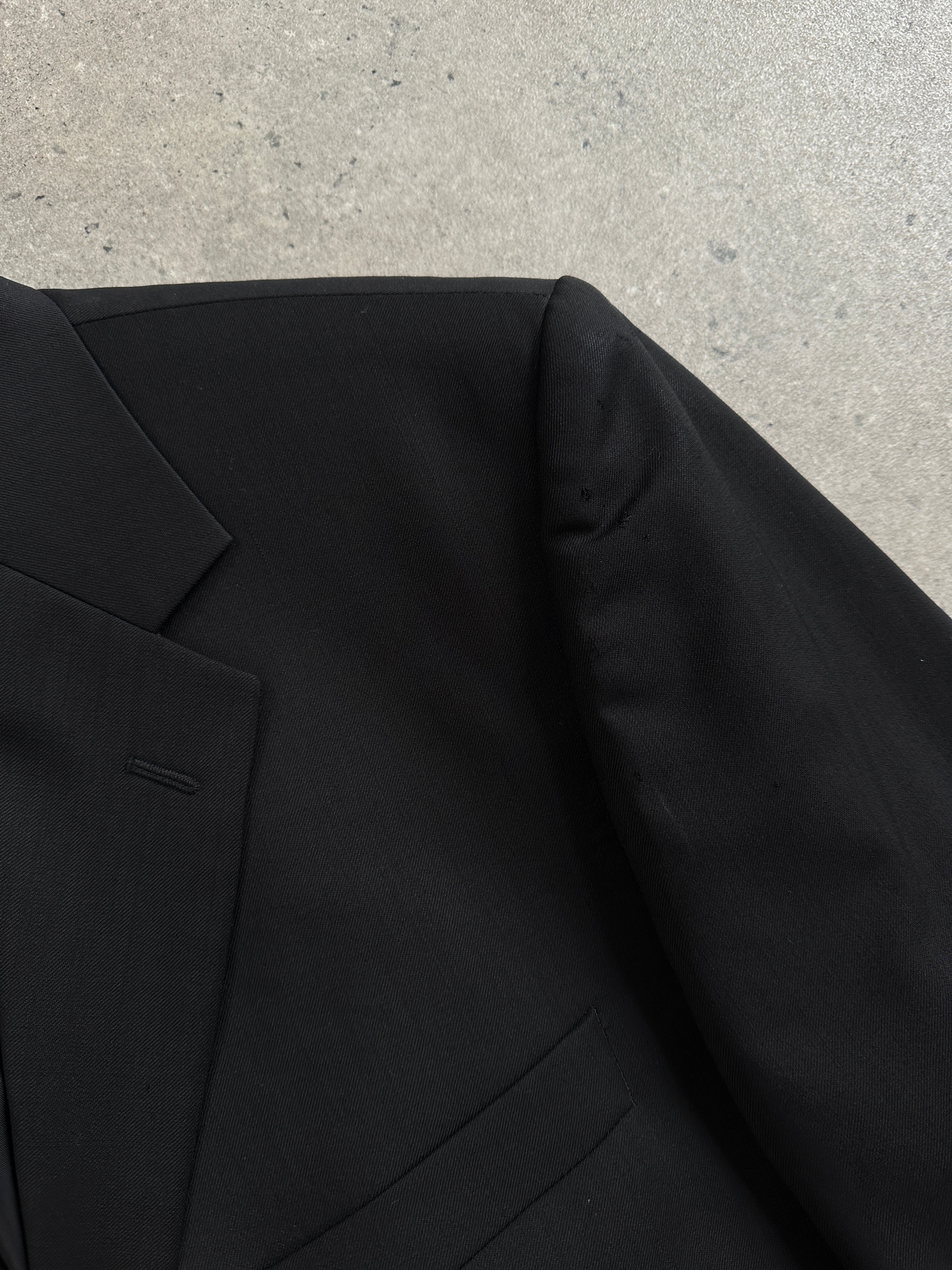 Yves Saint Laurent men's 1990s pure wool single-breasted blazer in size 40L/XL, shown in classic tailored fit with notch lapel.