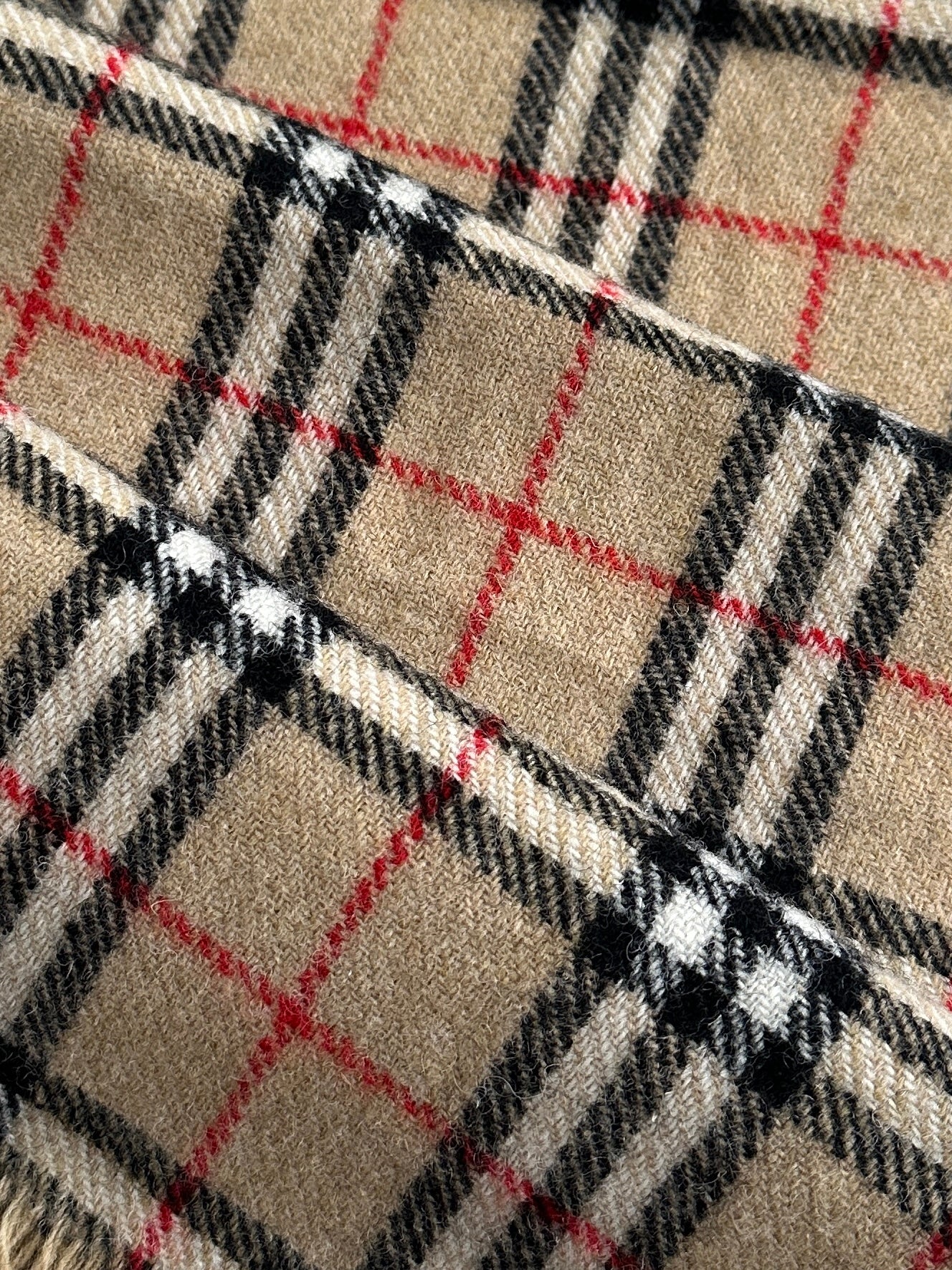 Burberry lambswool cashmere Nova Check scarf with classic plaid pattern, soft and cozy winter accessory.