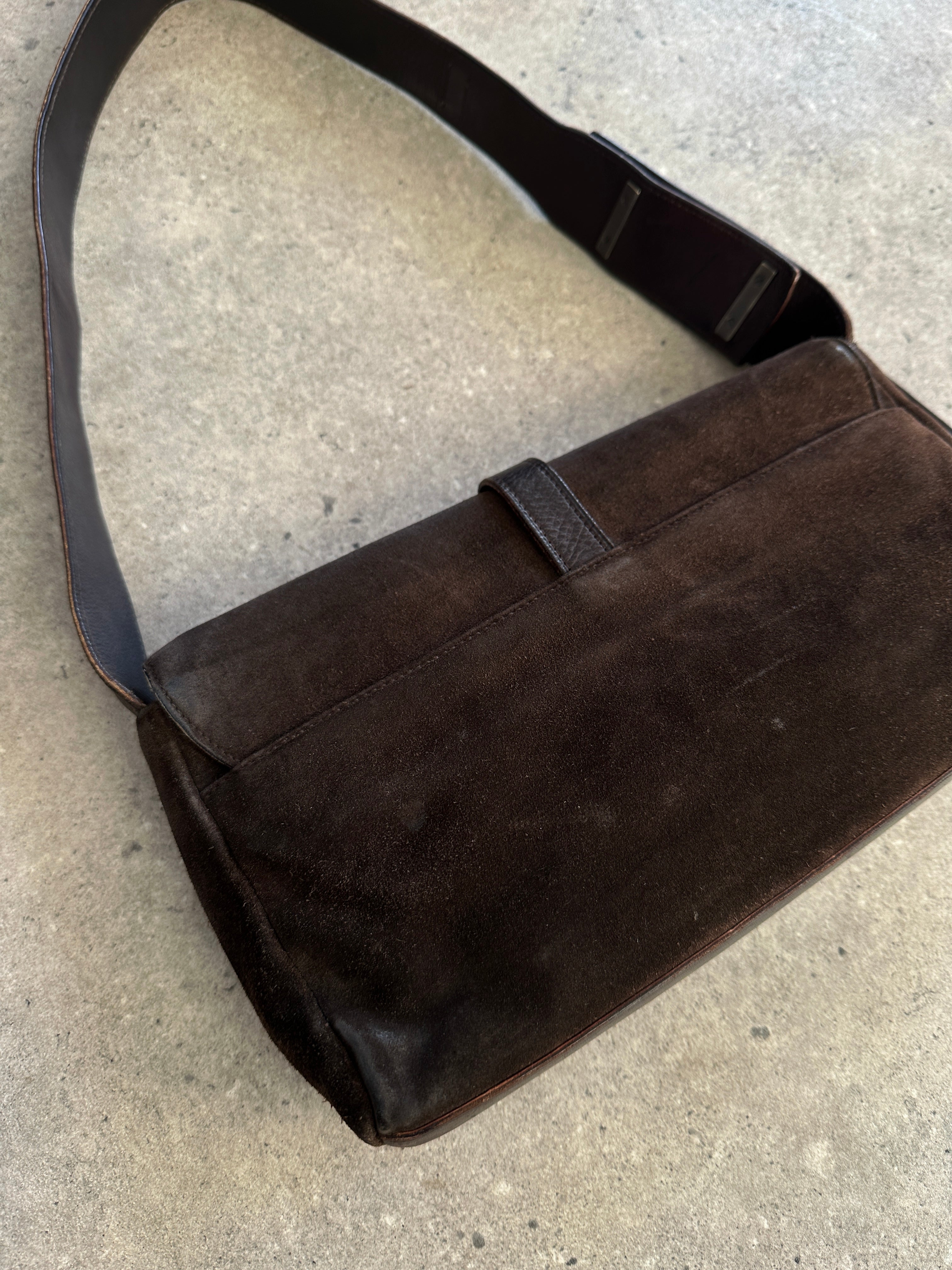 Yves Saint Laurent Rive Gauche 2000s suede shoulder bag with sleek design and shoulder strap, in a classic style.