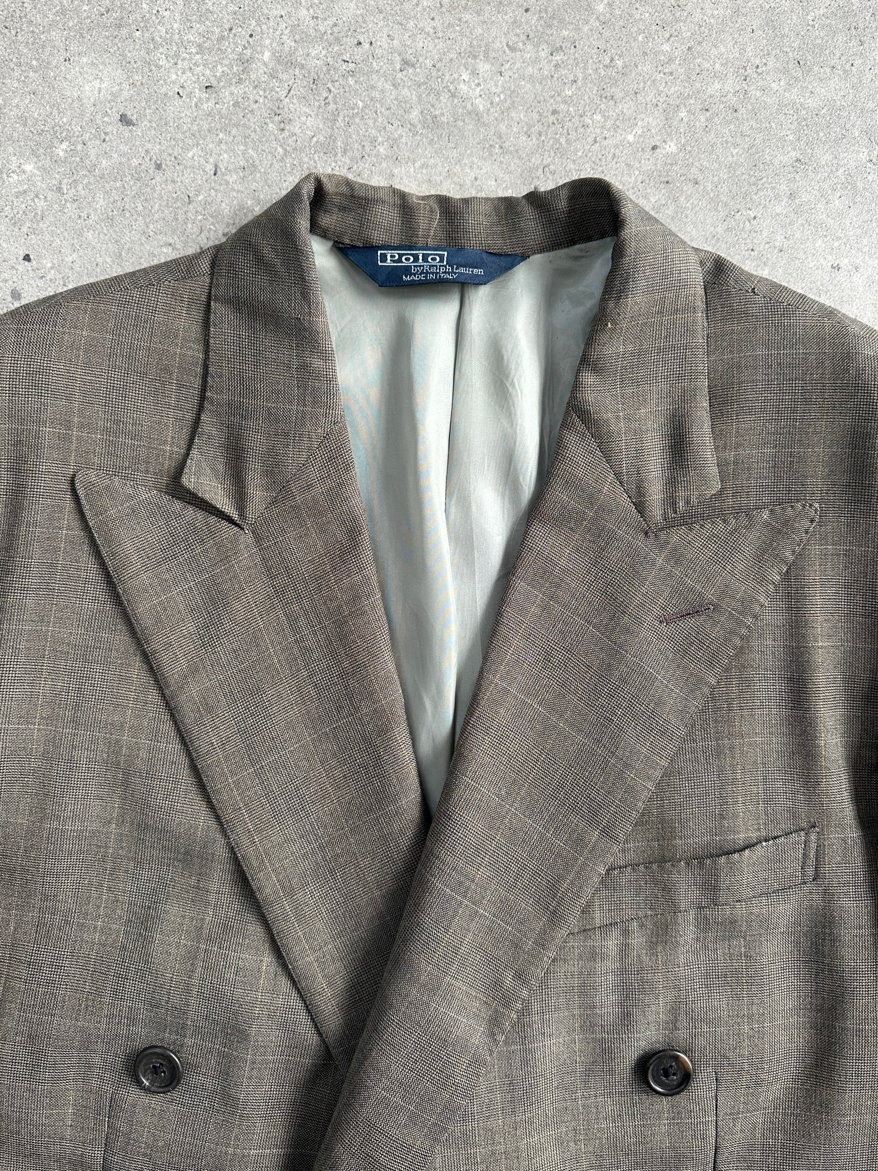Ralph Lauren Polo 1980s pure wool double-breasted blazer in size 44L/XXL, shown on a hanger with classic navy color and structured fit.