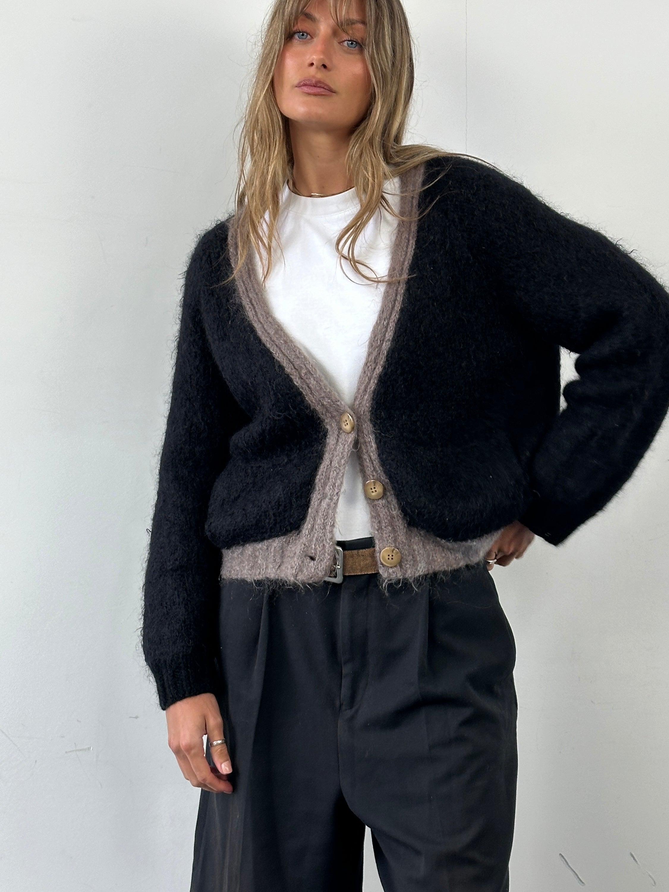 Vintage mohair wool fuzzy cardigan in size large, featuring a cozy, textured knit with a classic vintage style and relaxed fit.