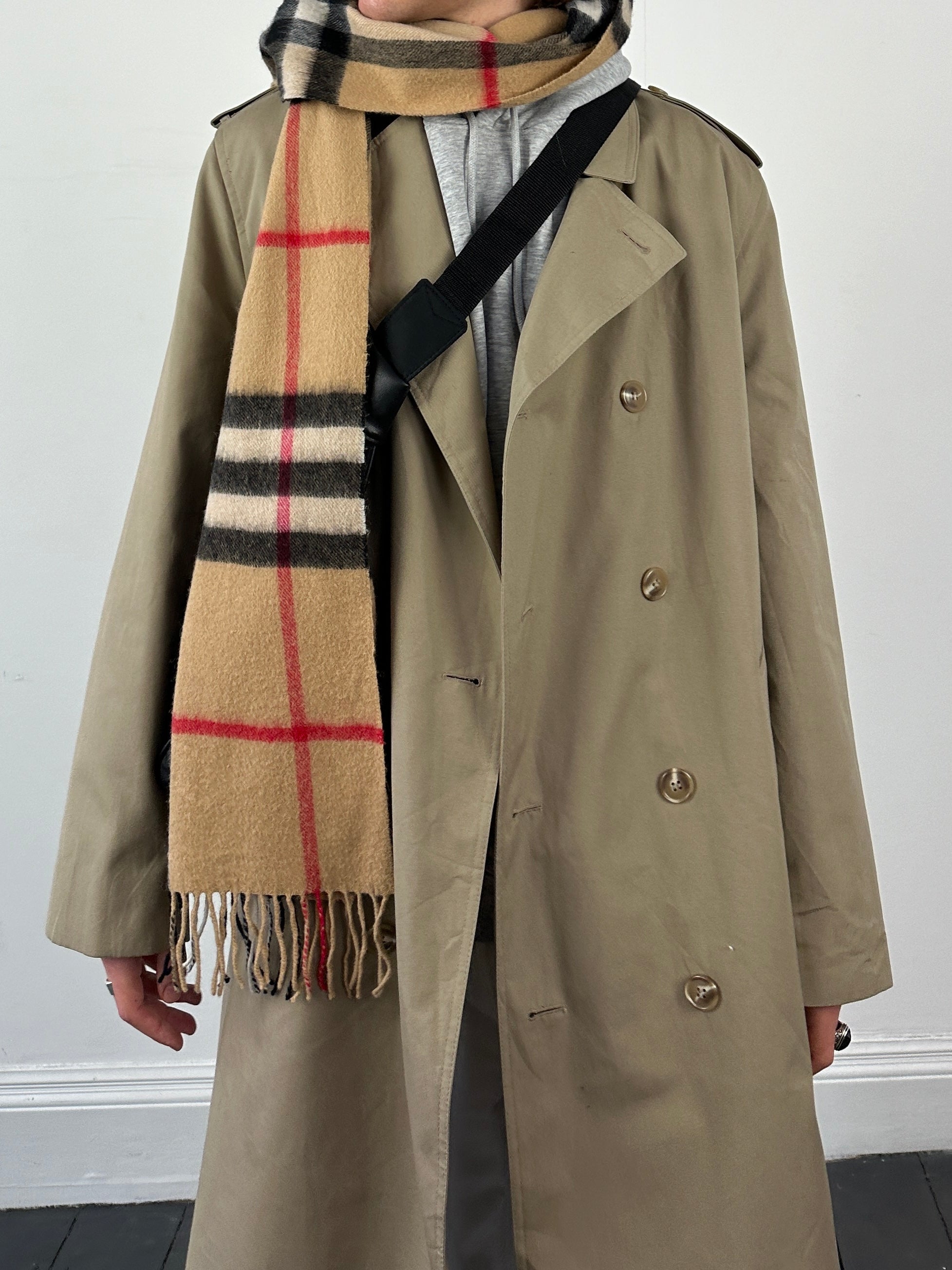 Vintage double-breasted fleece-lined trench coat in size XL, showcasing its classic style and warm, cozy fabric.