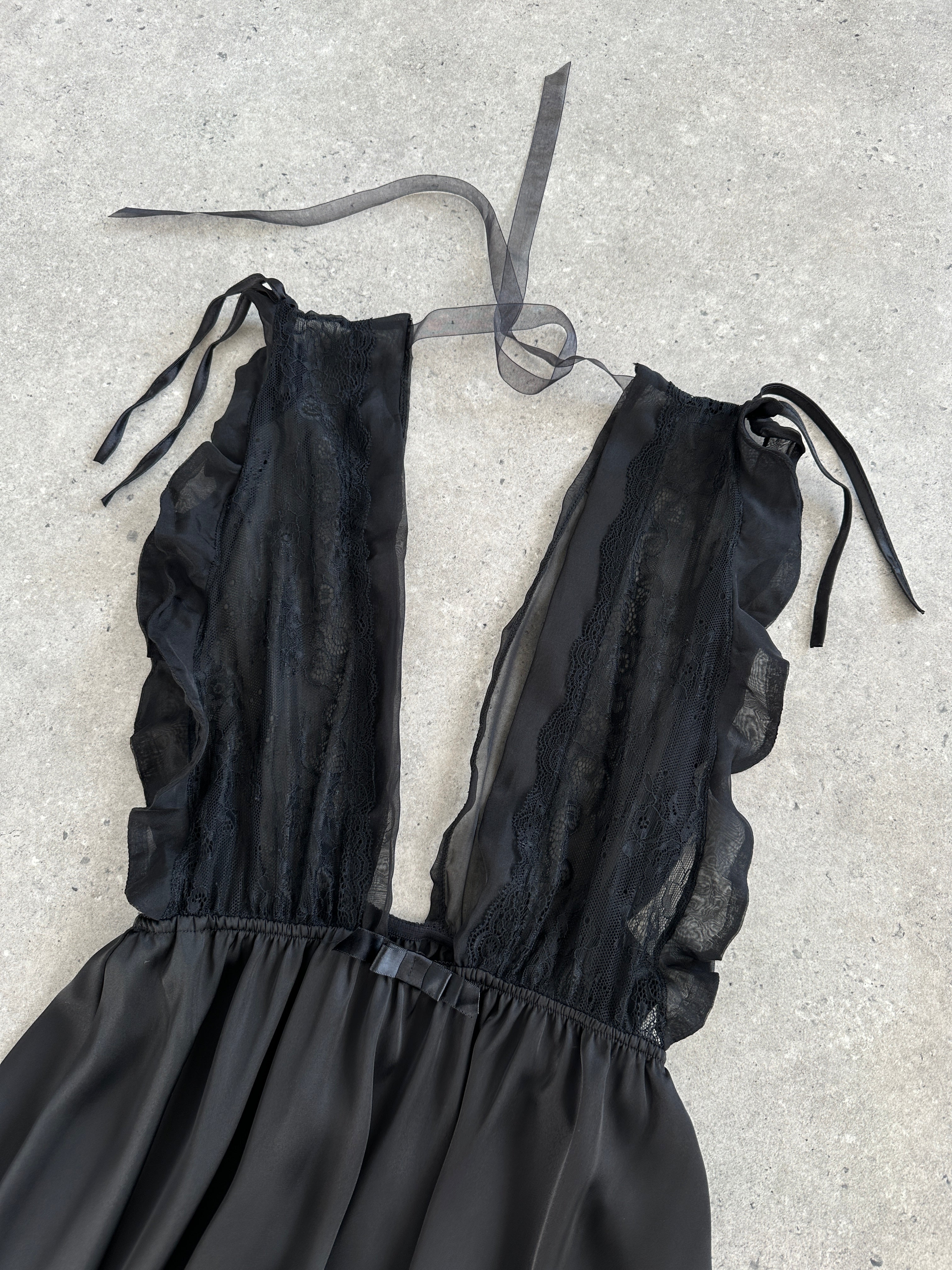 Vintage 2000s lace sheer satin babydoll top, size M, featuring delicate lace details and a silky, flowing design.