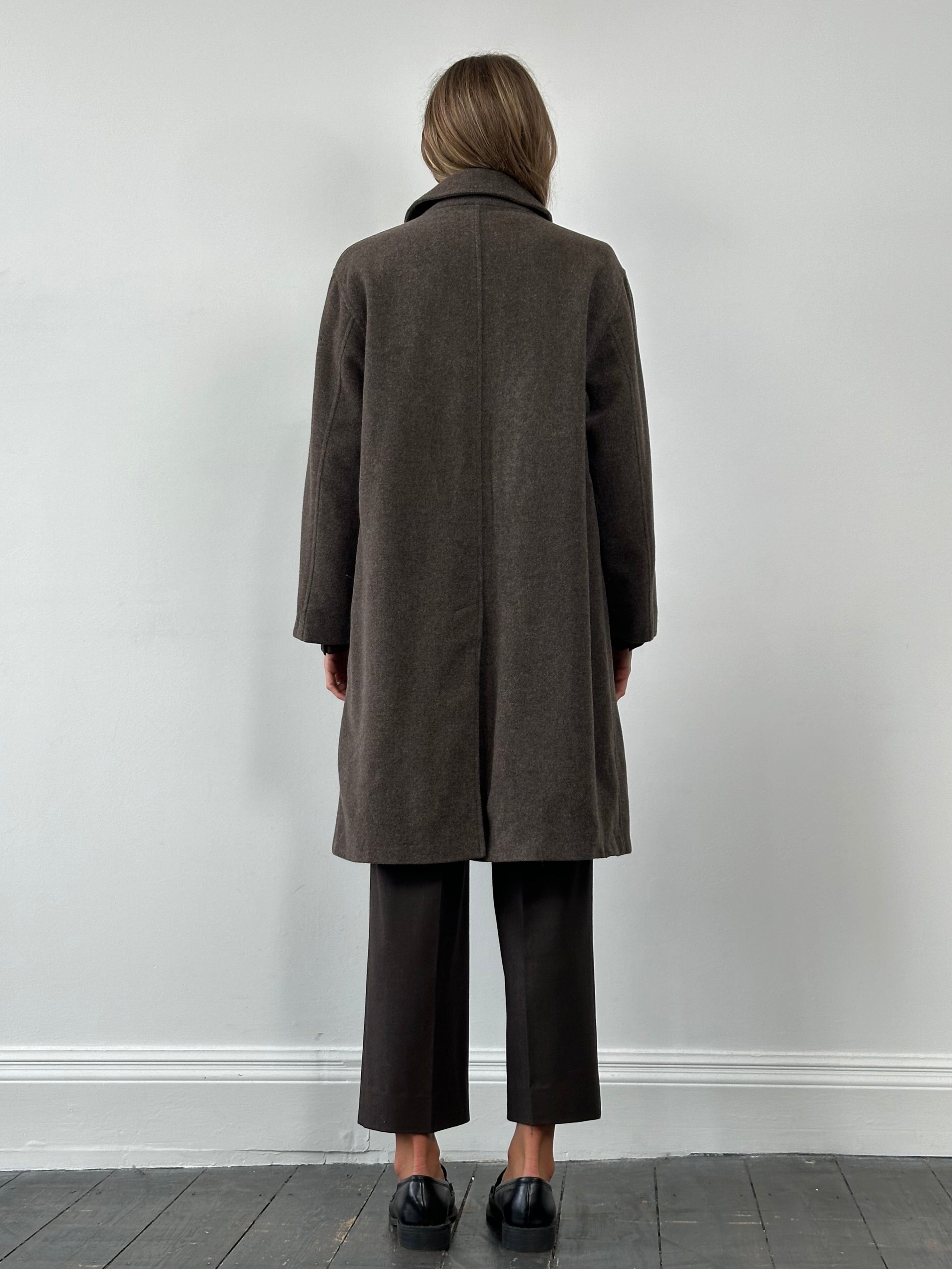 Armani Jeans single-breasted coat made from pure virgin wool, in size large, displayed on a hanger.