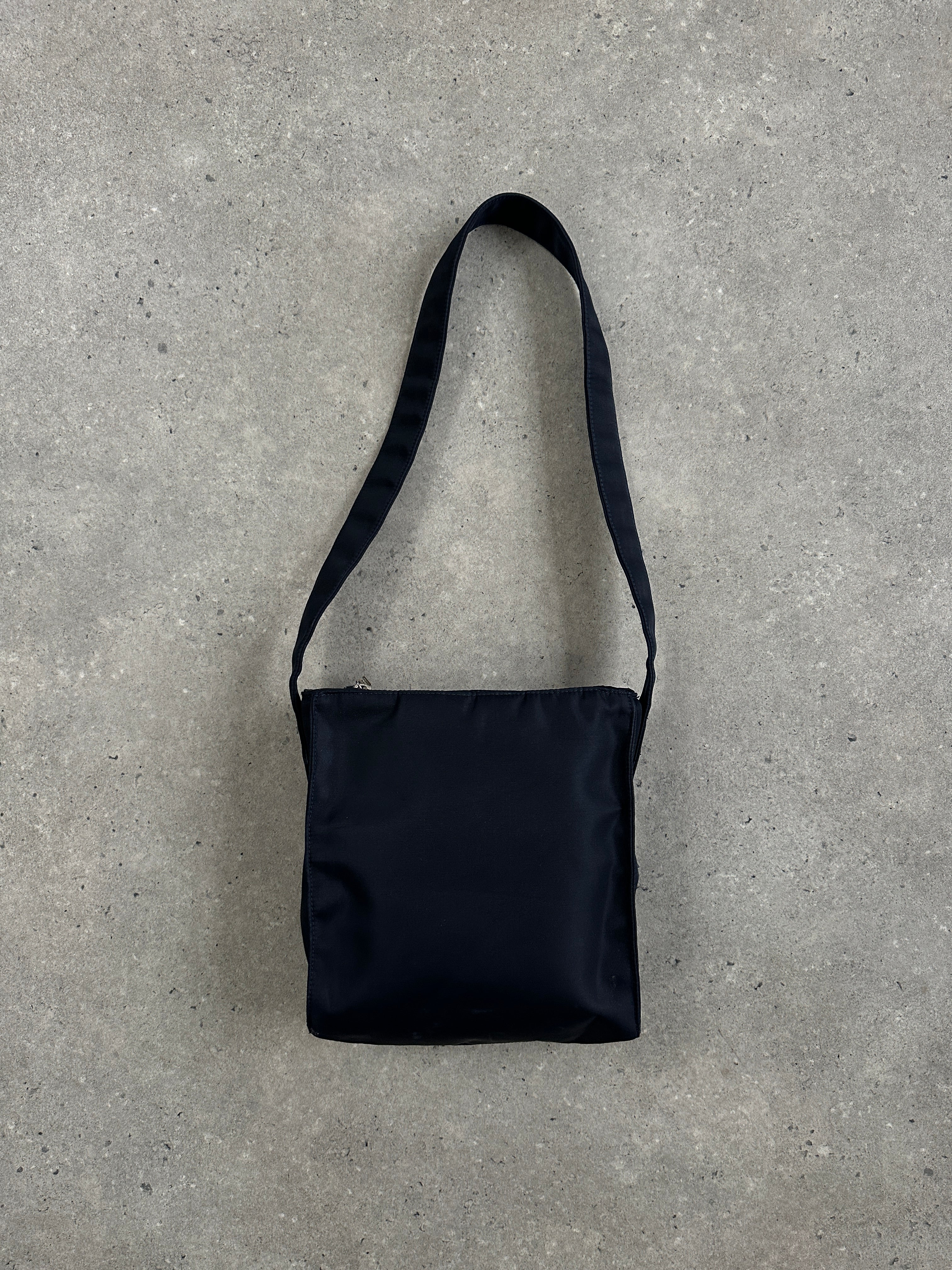 Armani Jeans 2000s nylon shoulder bag with adjustable strap and sleek design, perfect for casual or stylish wear.