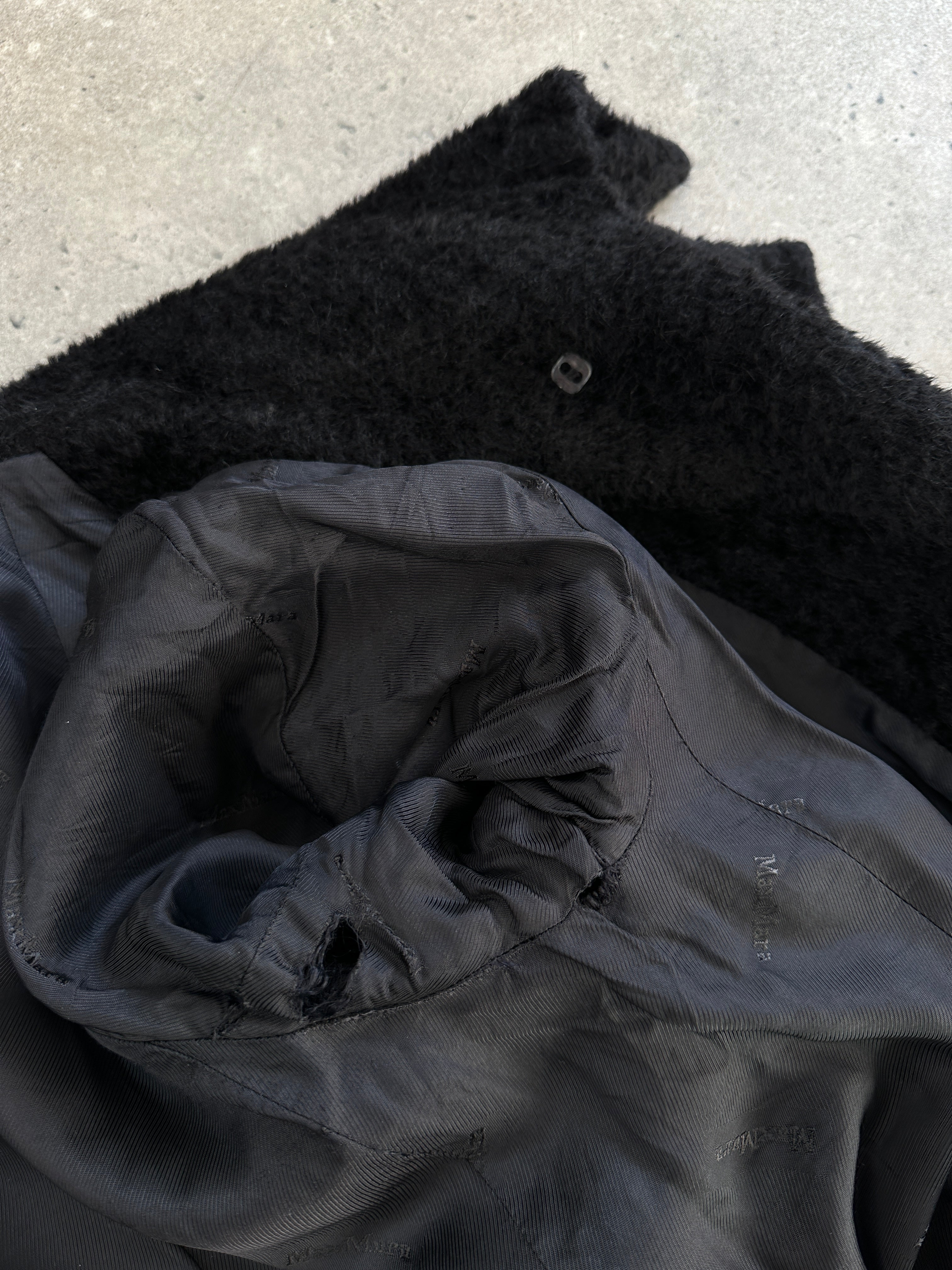 Max Mara Teddy alpaca wool coat in S/M, showcasing its plush texture and stylish design in a neutral color.