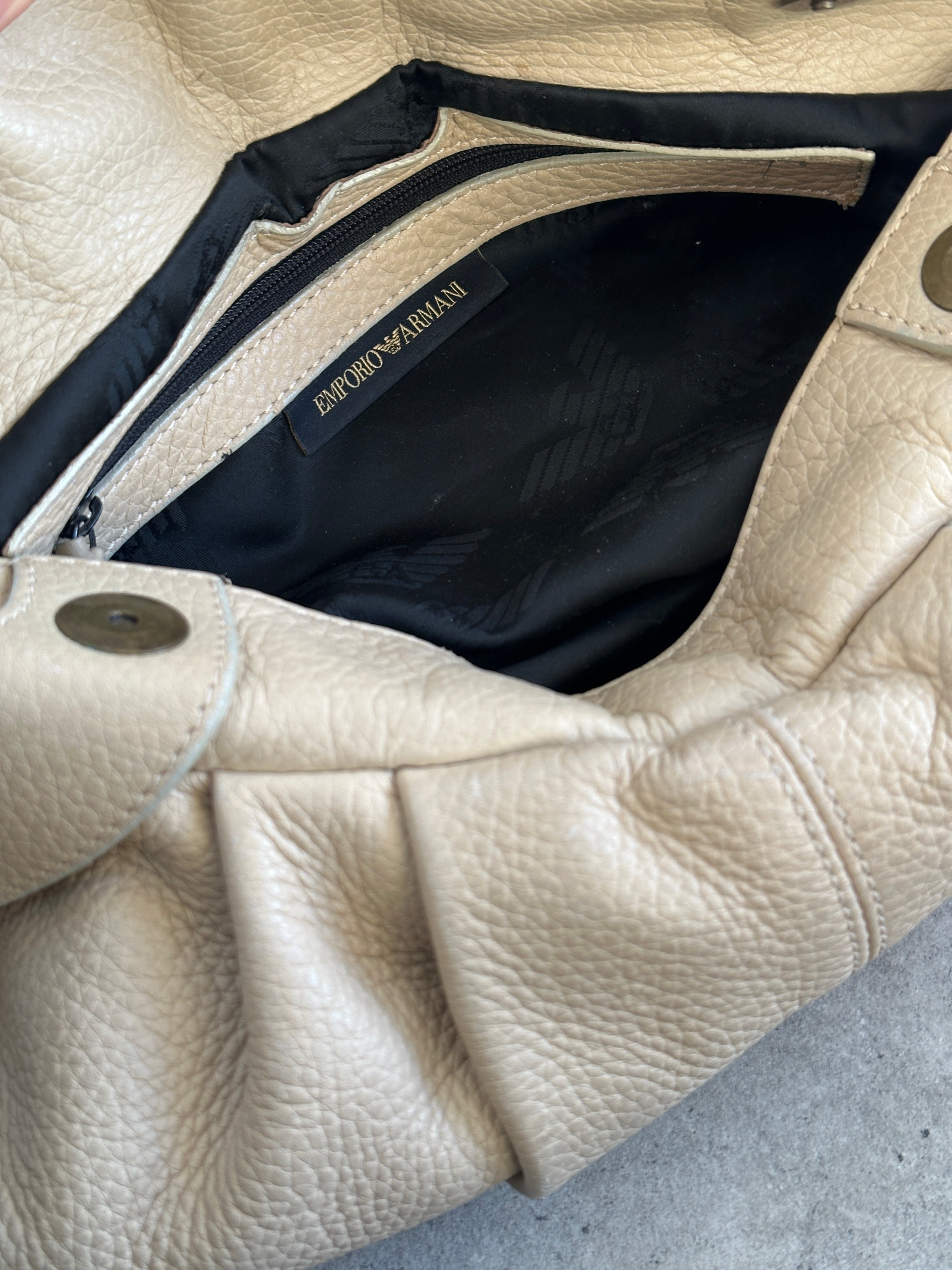 Emporio Armani leather pleated shoulder bag with structured design and shoulder strap, vintage 2000s style.