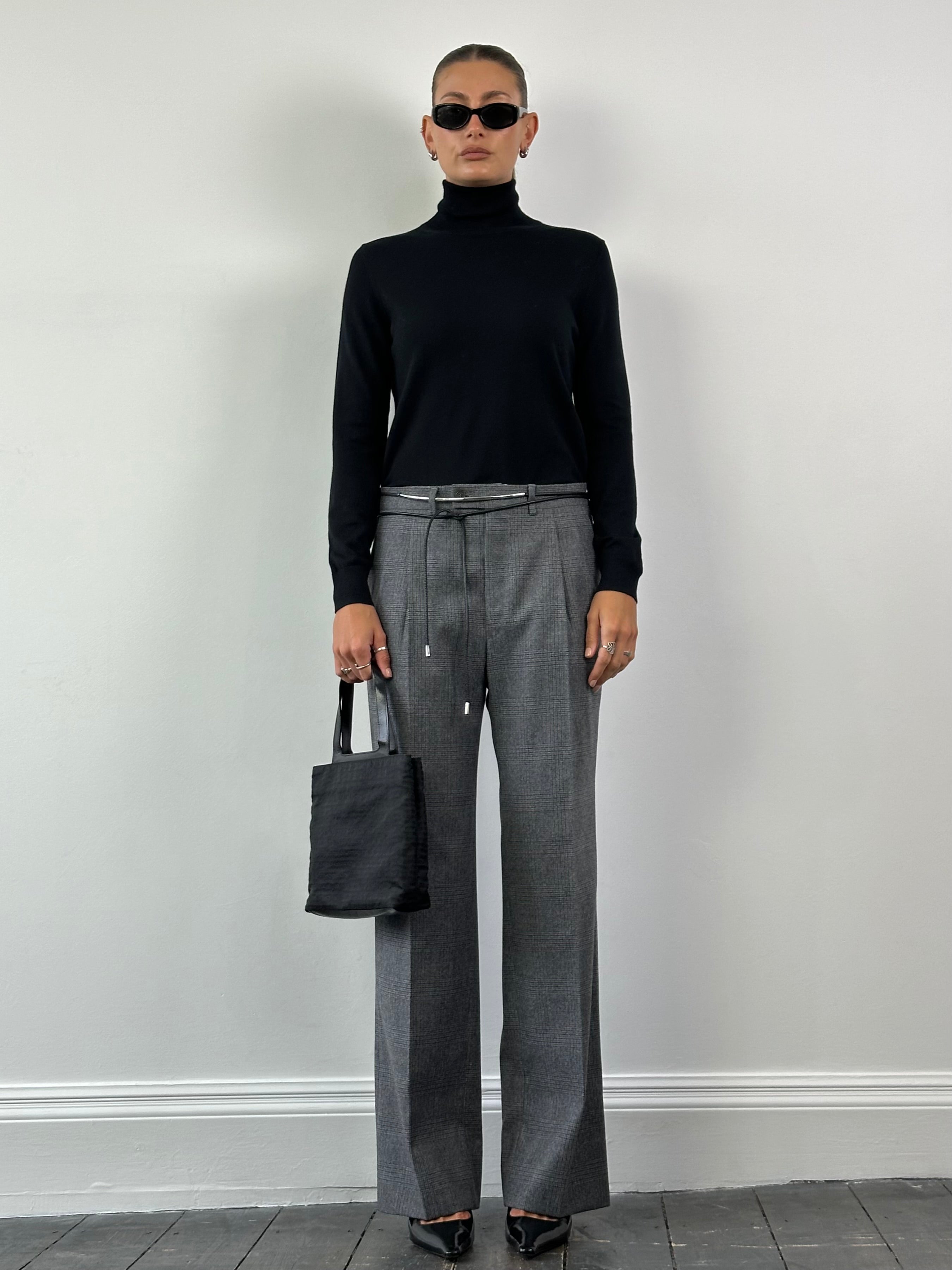 Vintage Italian brushed wool check tailored trousers in size W30, featuring a classic plaid pattern and a tailored fit.