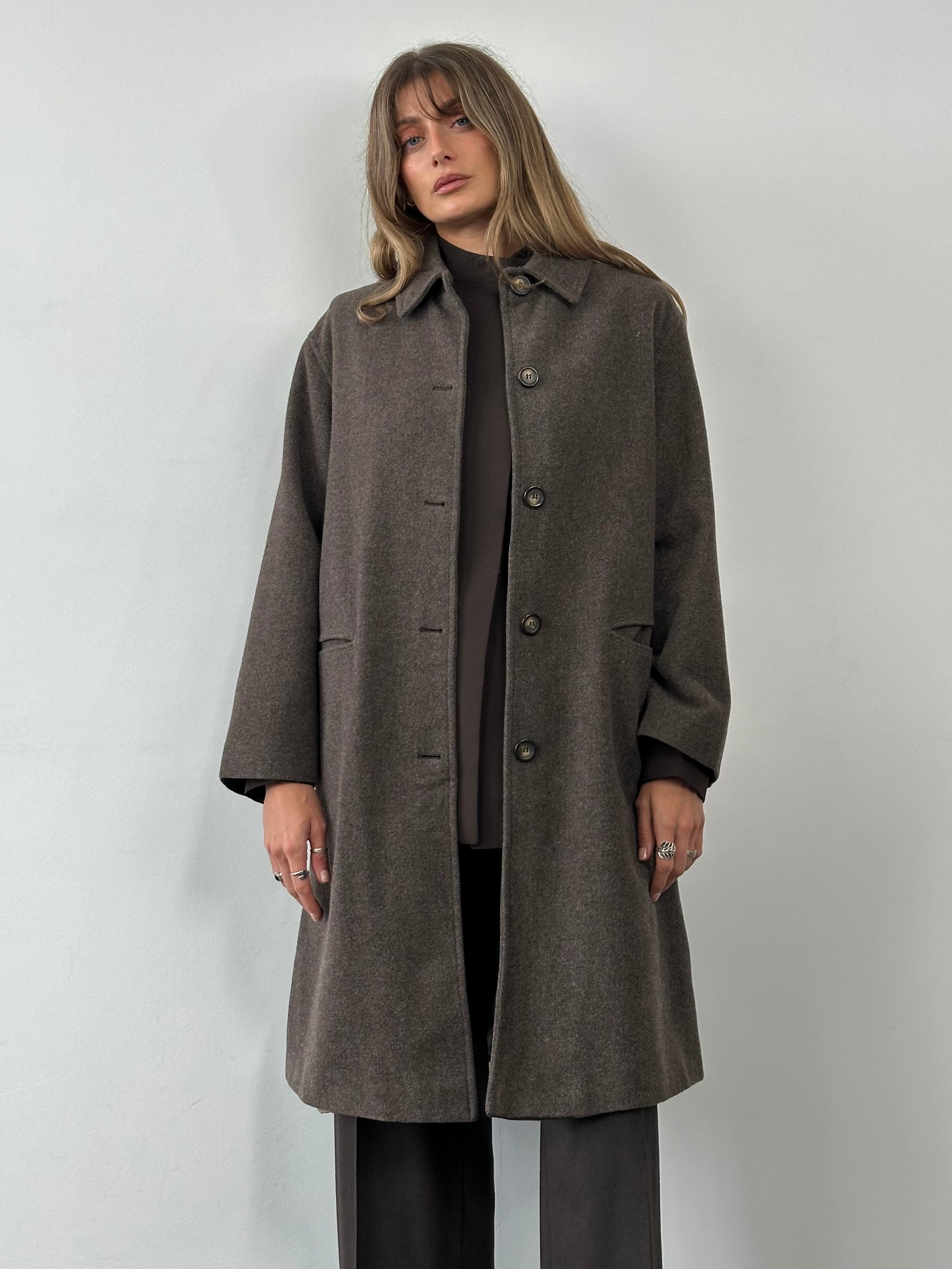 Armani Jeans pure virgin wool single-breasted coat in size L, shown in black with classic lapel collar and button closure.