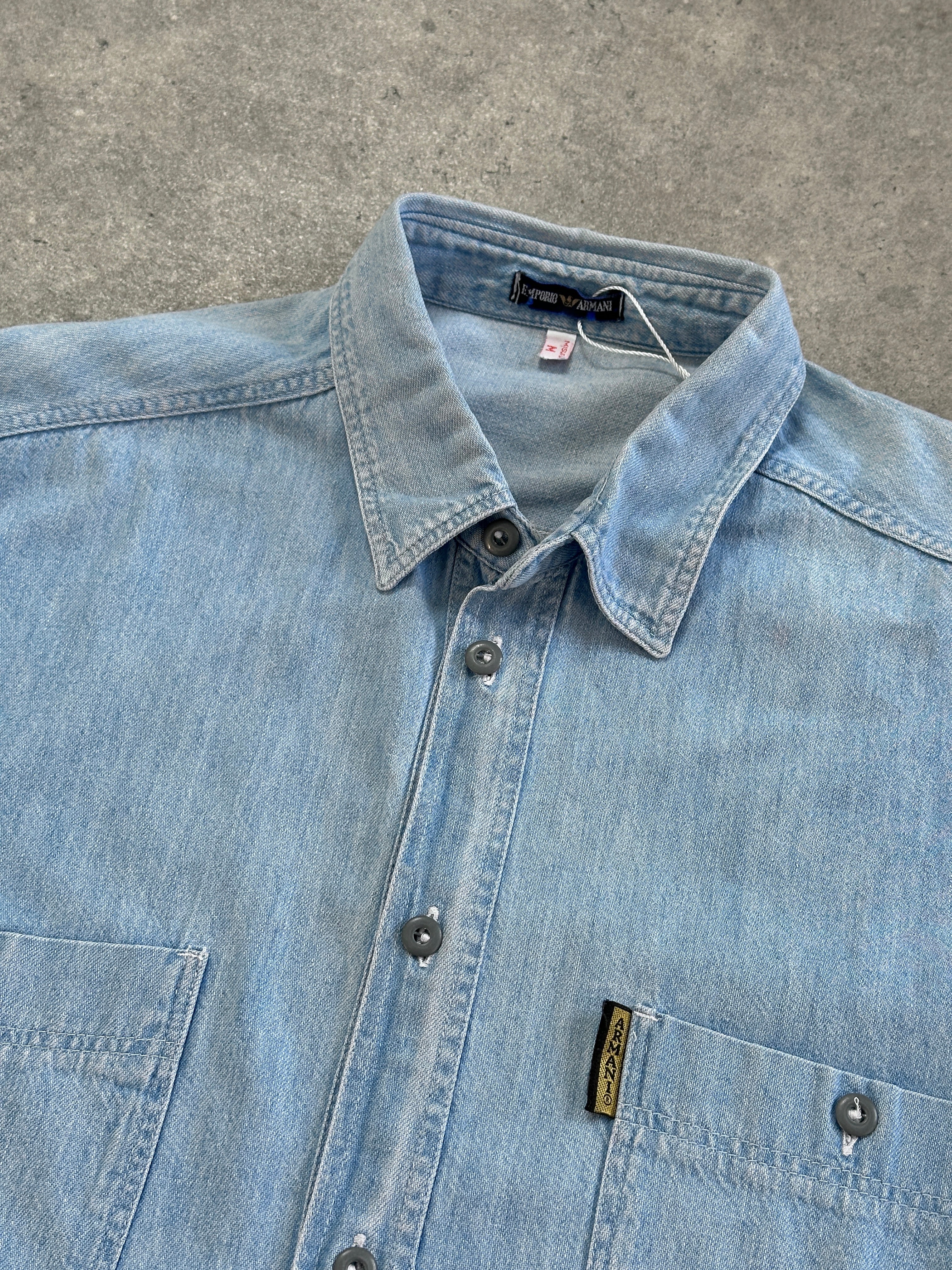 Armani Jeans pure cotton denim logo shirt in size XL, featuring a classic design with visible Armani branding and denim fabric.