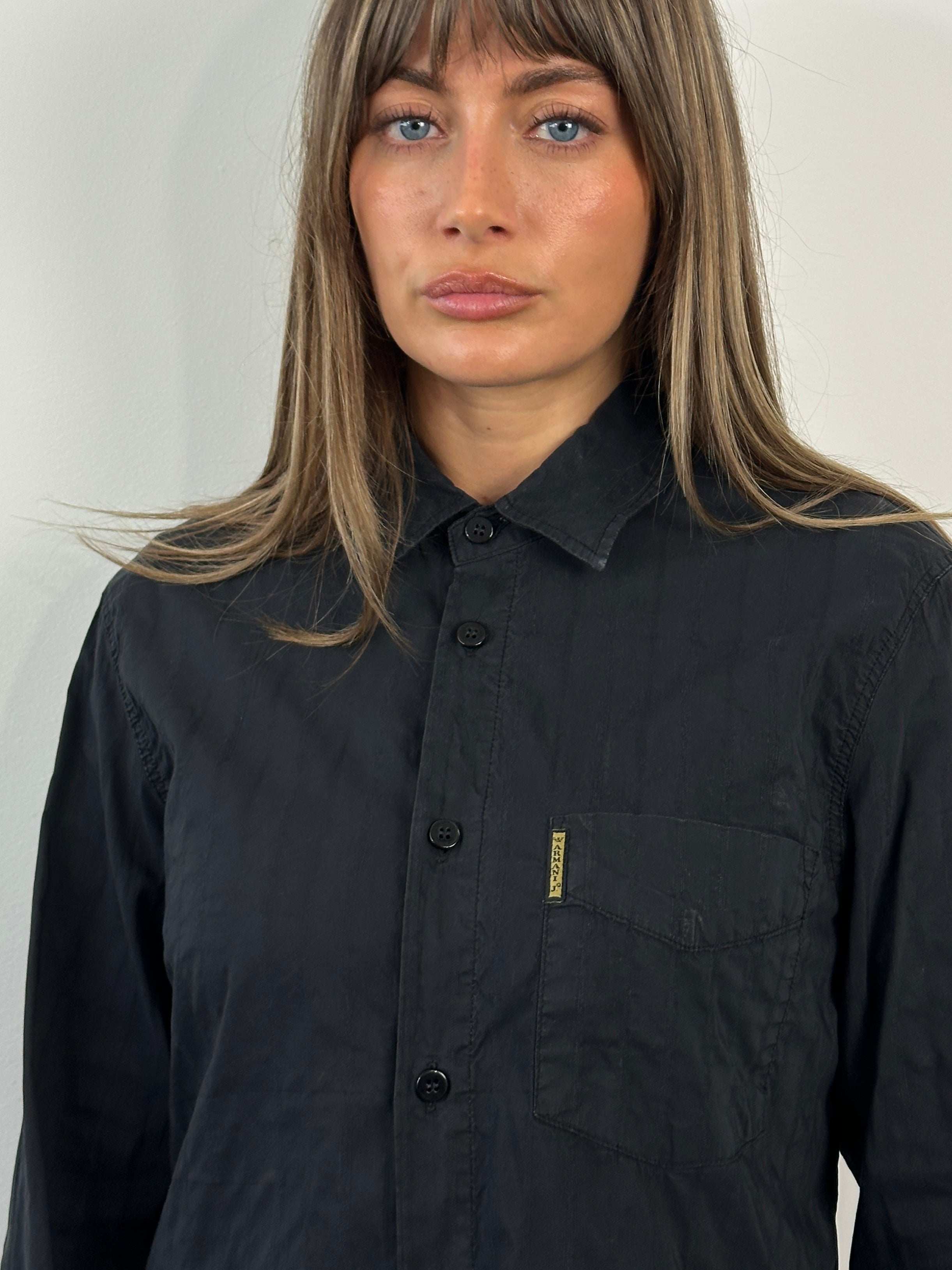 Armani Jeans 1990s cotton logo shirt in size M, featuring classic design and brand logo on the front.