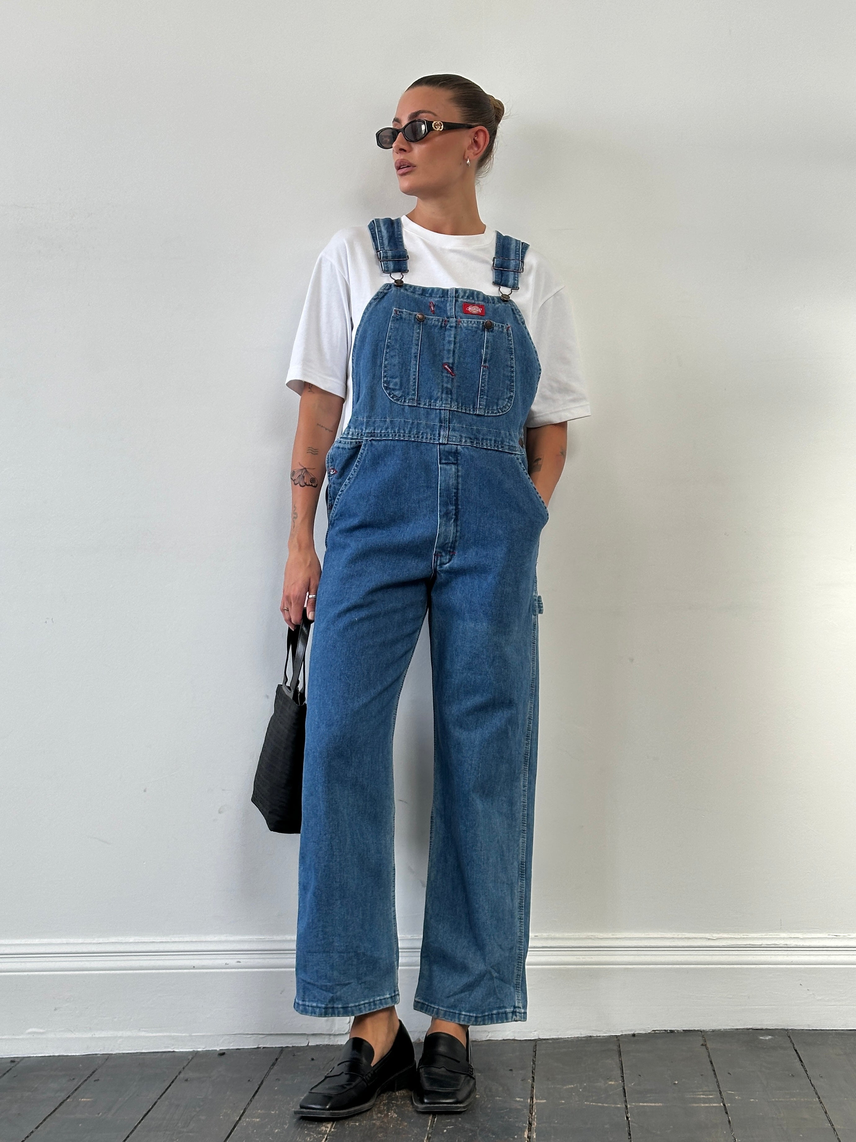 Dickies pure cotton denim dungarees in size medium, showcasing classic blue workwear style with adjustable straps and front pockets.